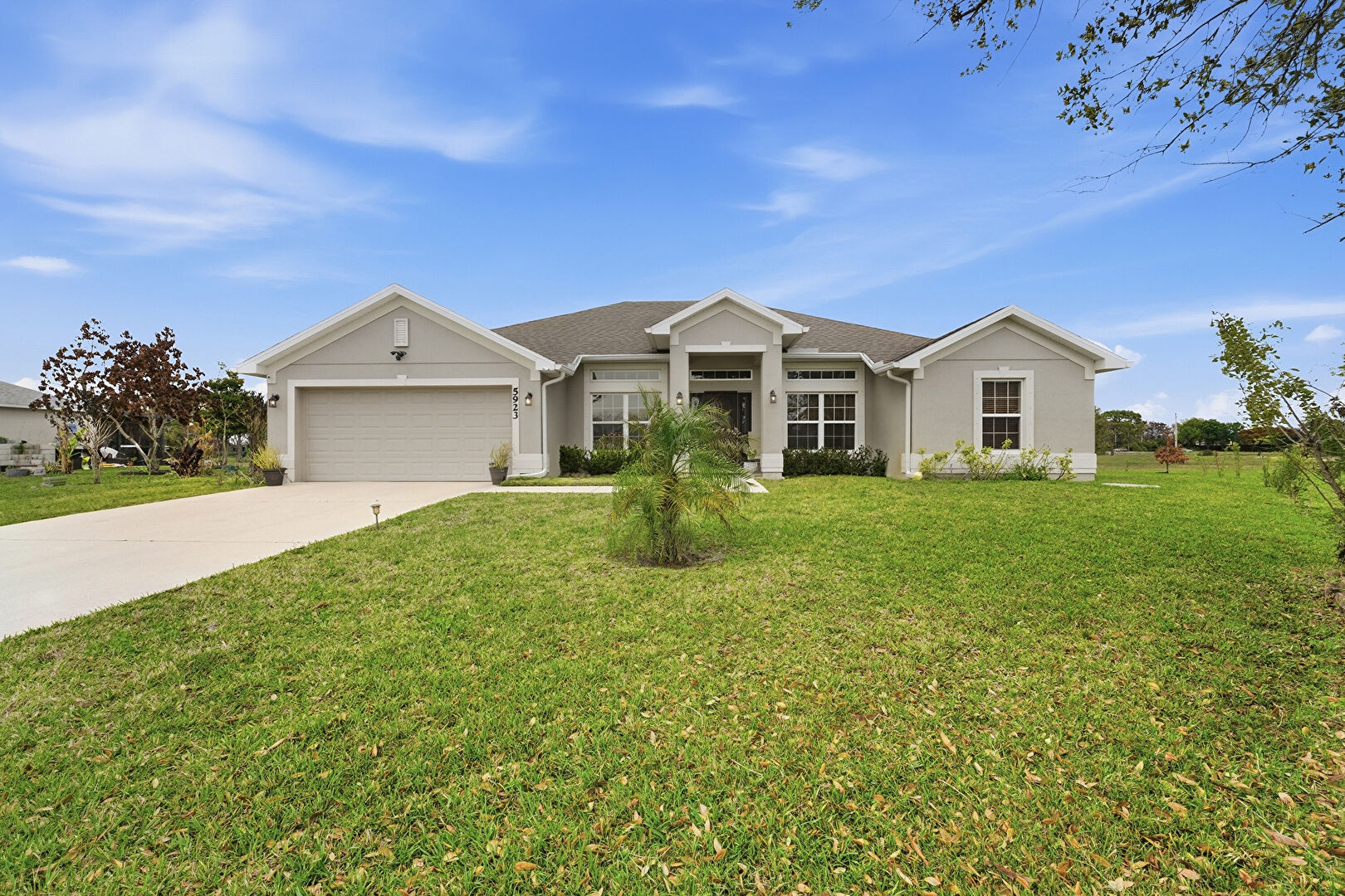 Front at 5923 Northwest Brianna Court, Port St. Lucie, FL 34986, listed by Jodi-Ann Wallace