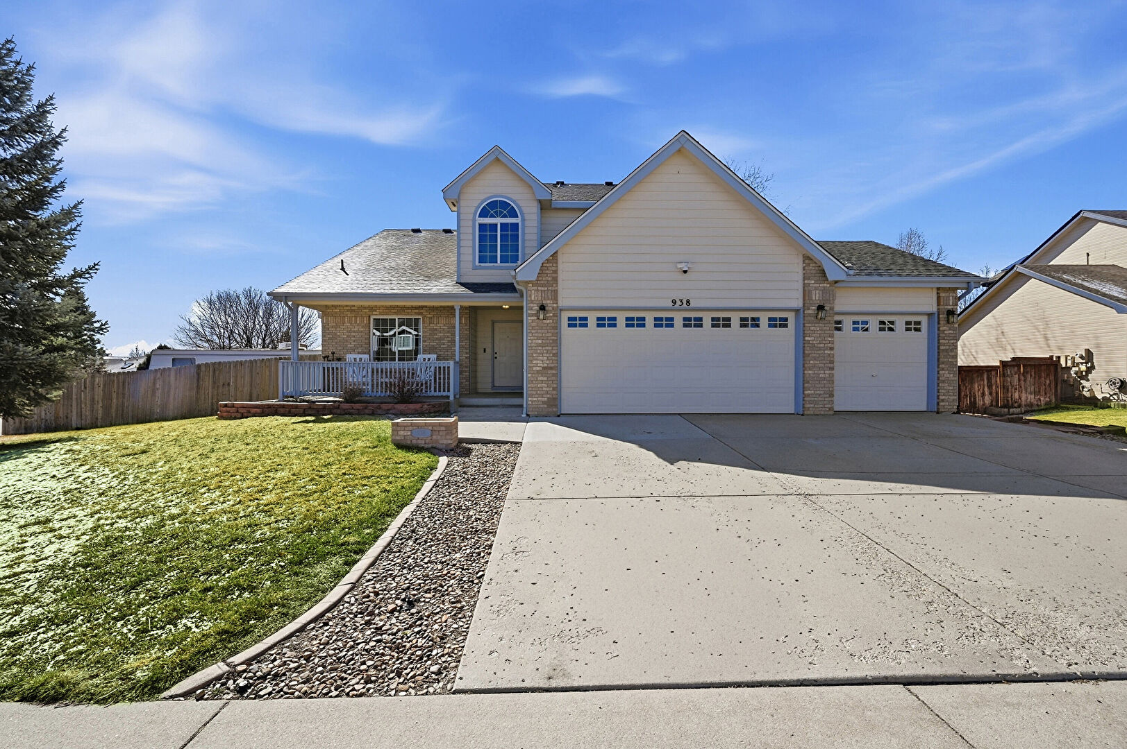 Front at 938 Wisteria Drive, Loveland, CO 80538, listed by Philip Cooper