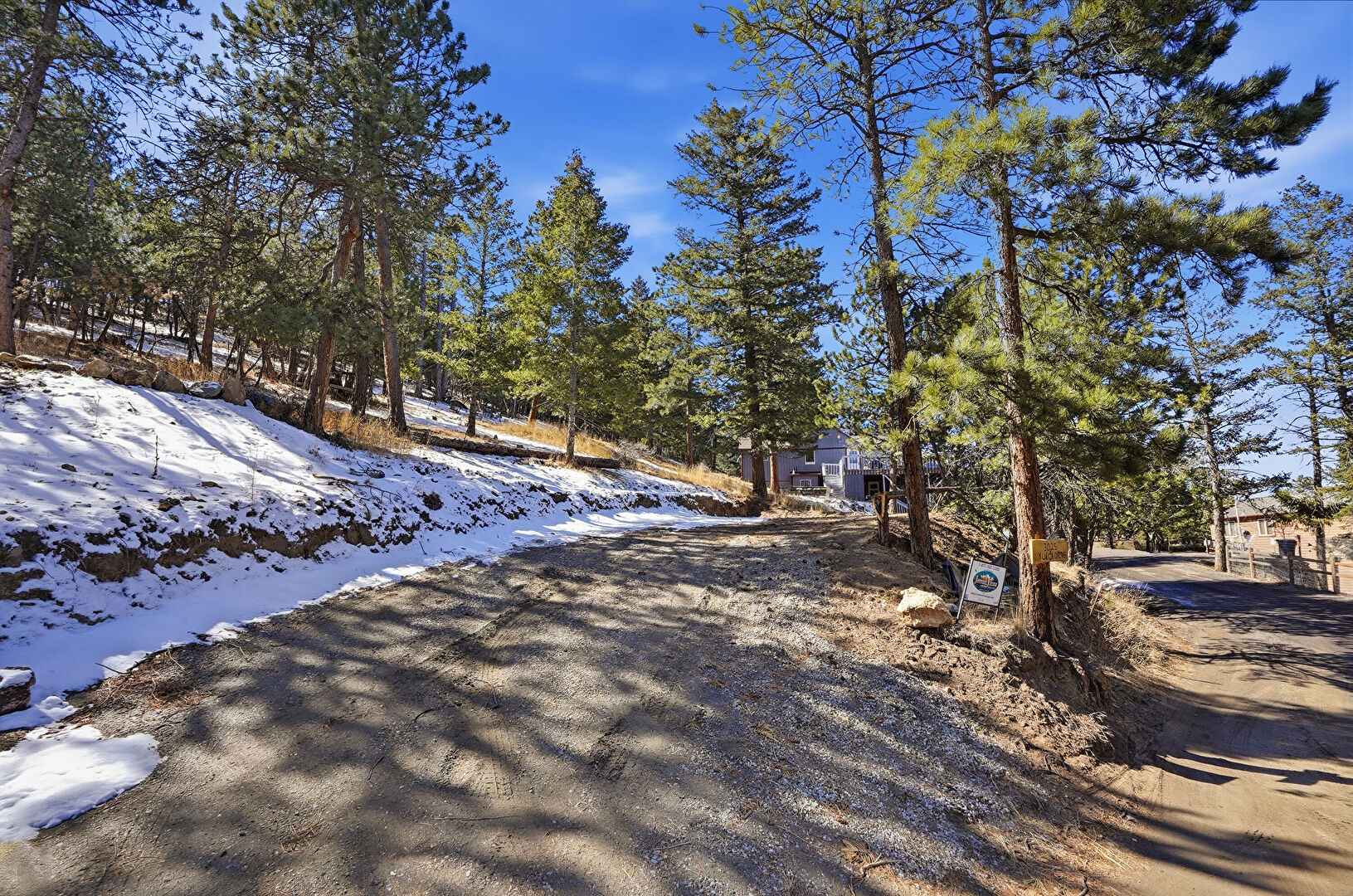 Yard at Yucca Drive, Evergreen, CO 80439, listed by K.C. Golfinopoulos