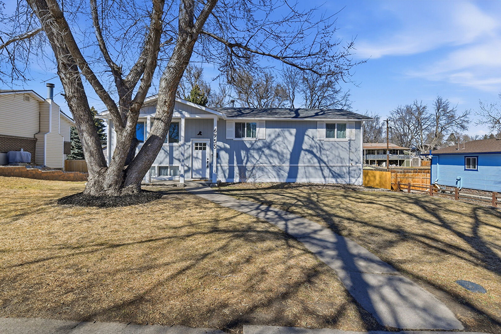 Front at 6955 West 62nd Avenue, Arvada, CO 80003, listed by Robert Gruber