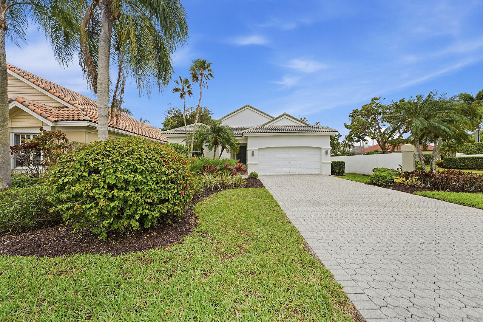 Front at 8321 Bob-O-Link Drive, Palm Beach Gardens, FL 33412, listed by Chris Dyer