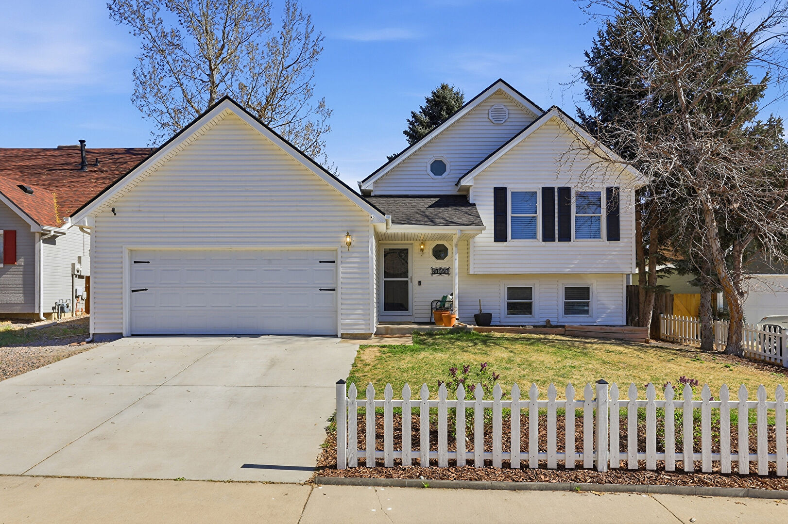 Front at 17557 East Chenango Drive, Aurora, CO 80015, listed by Tatyana Sturm