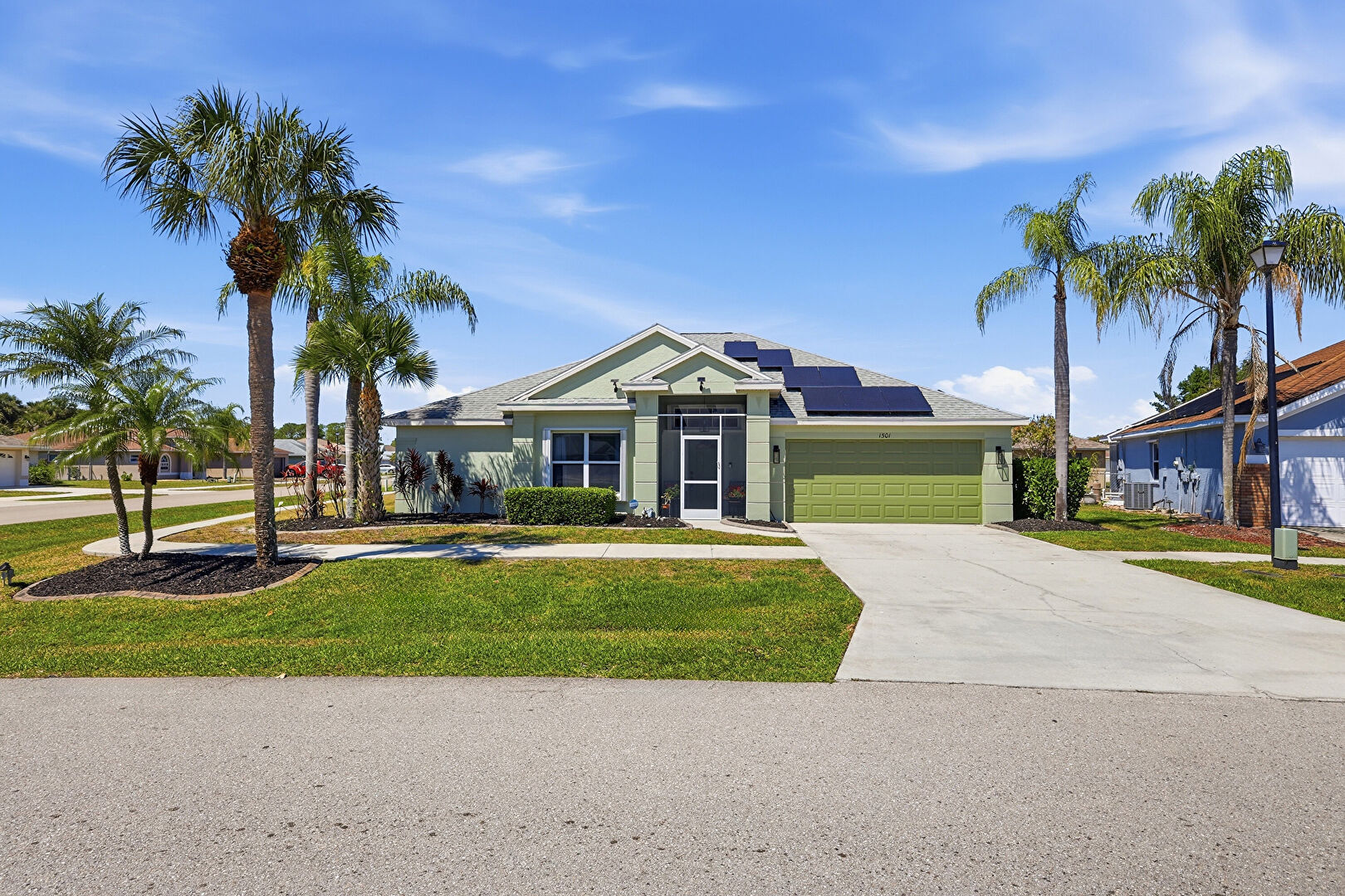 Front at 1501 Honor Court, Lehigh Acres, FL 33971, listed by Brett Ellis, MLS ID: 2026014385