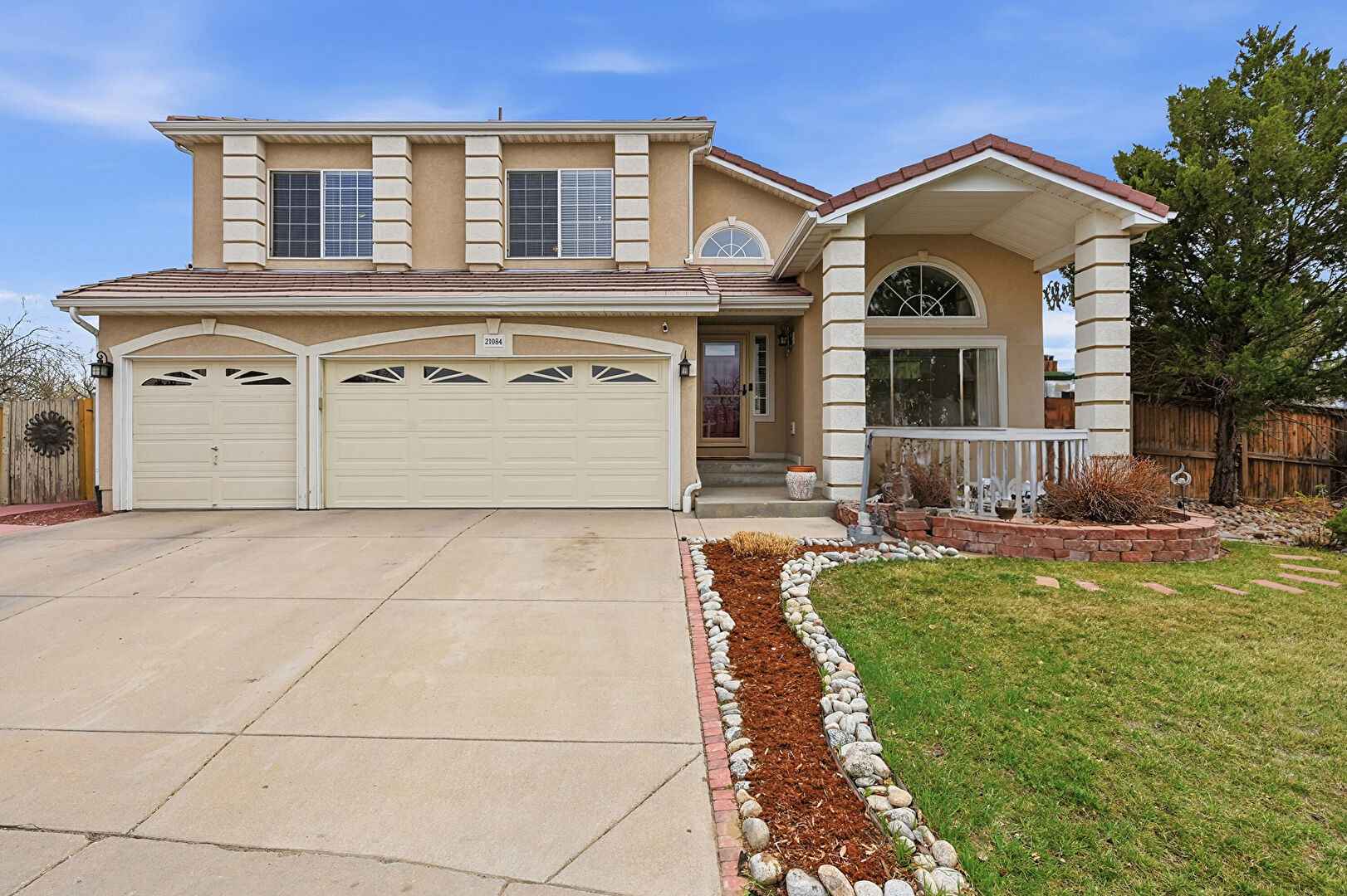 Front at 21084 East 49th Avenue, Denver, CO 80249, listed by Tatyana Sturm