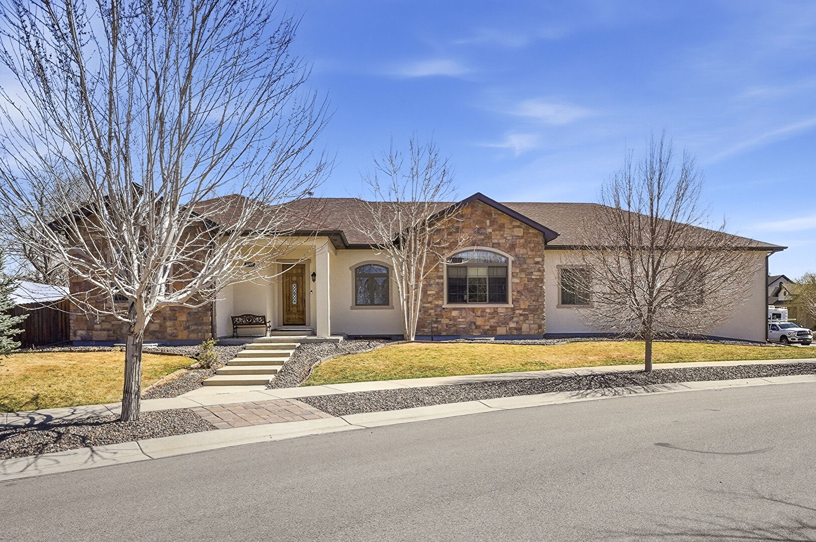 Front at 8185 West Tennessee Drive, Lakewood, CO 80226, listed by Tamila Aspen