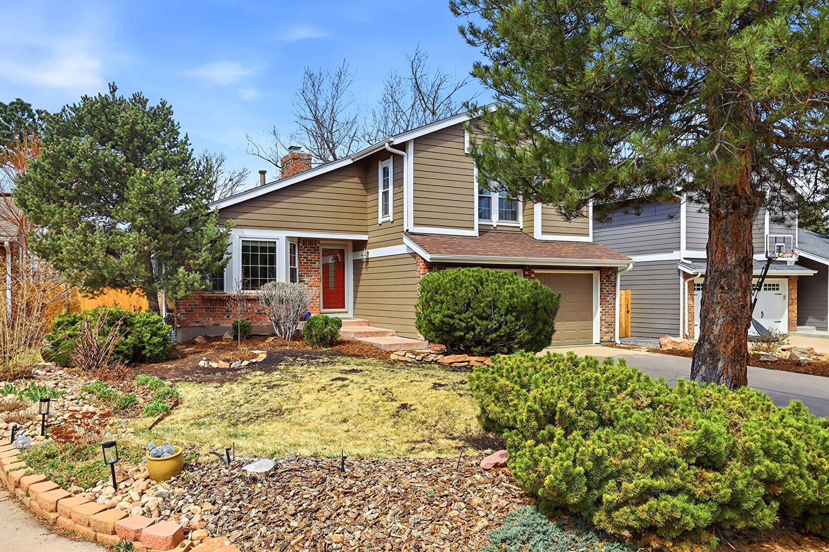 Front at 8113 South Spruce Court, Centennial, CO 80112, listed by Cindy Mitchell