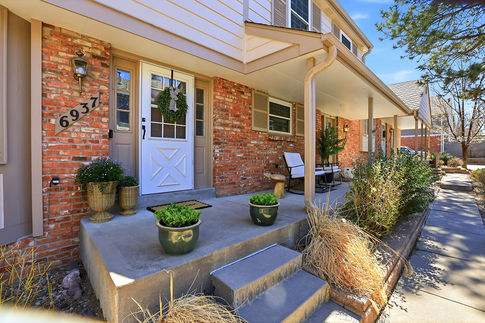 Exterior Entry at 6937 East Briarwood Drive, Centennial, CO 80112, listed by Dalton Addison, MLS ID: 9572754