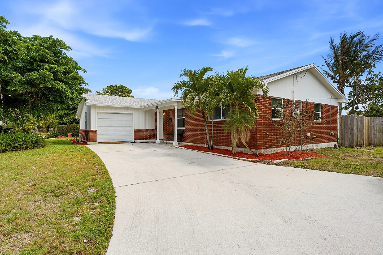 Front at 1509 West Road, West Palm Beach, FL 33403, listed by Anna Lopez