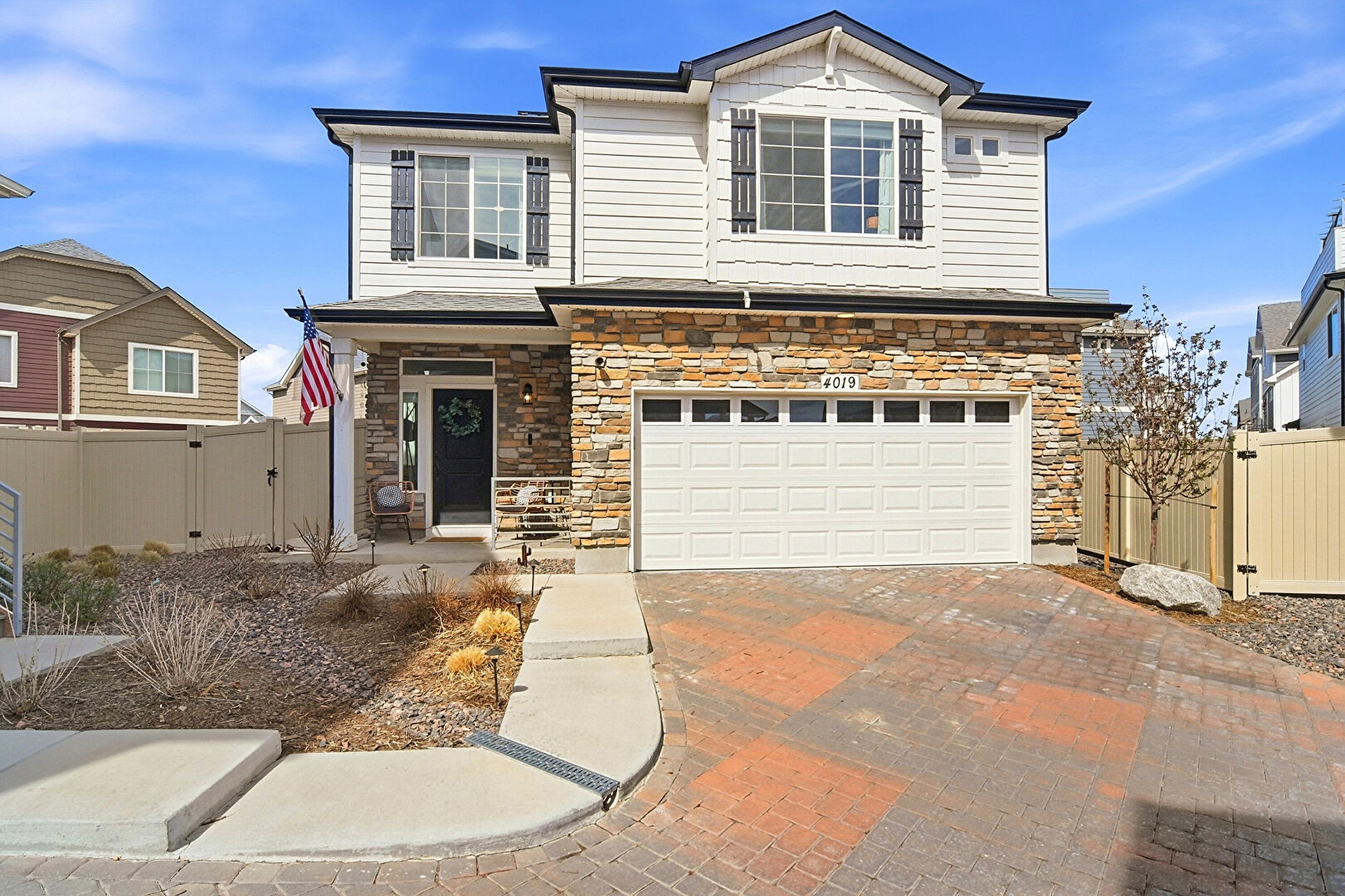 Front at 4019 North Quatar Court, Aurora, CO 80019, listed by Mike & Ed Hardey