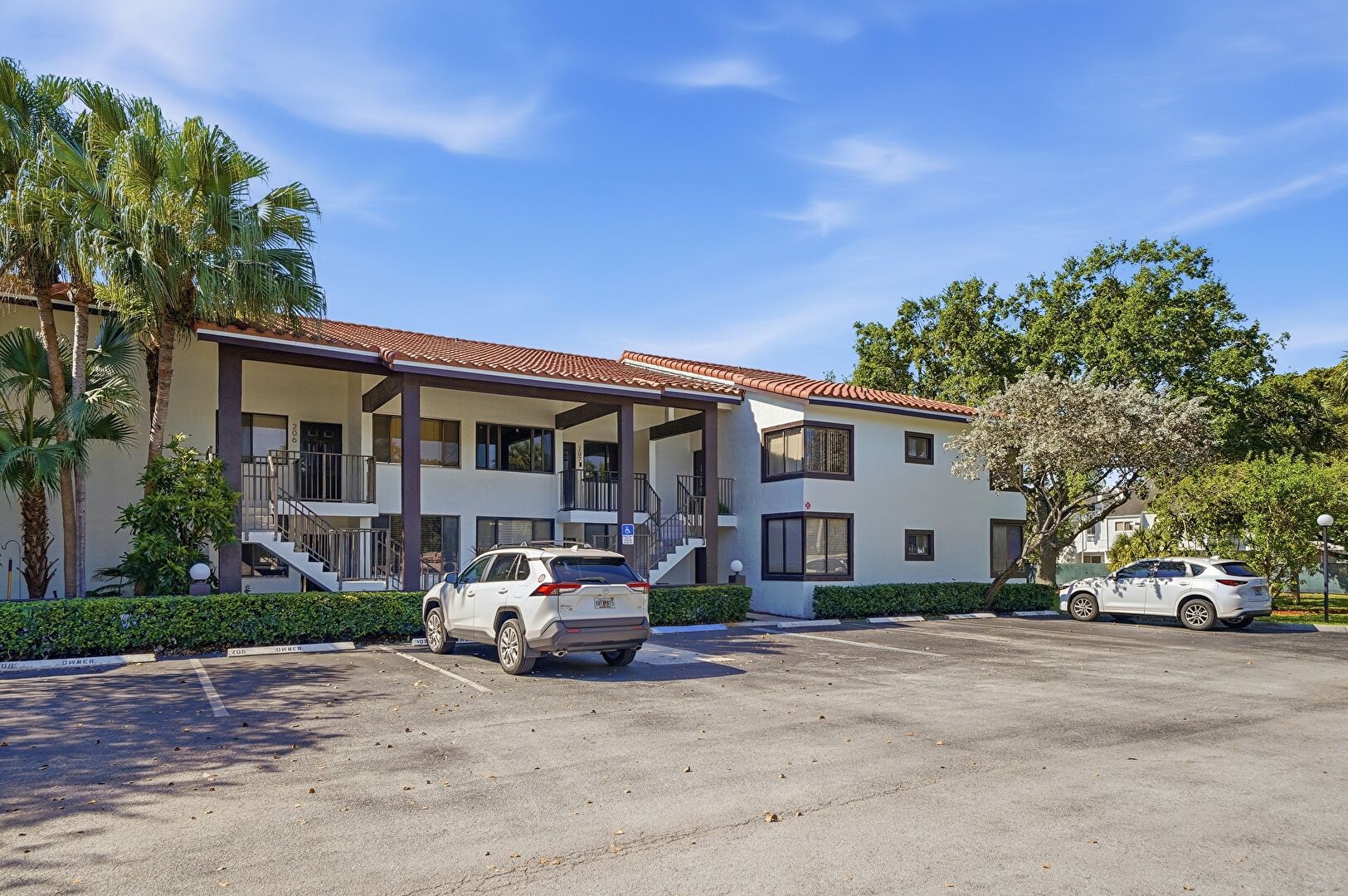 Front at 3300 nw 46th st., unit 106, oakland park, FL 33309, listed by Heather Chura