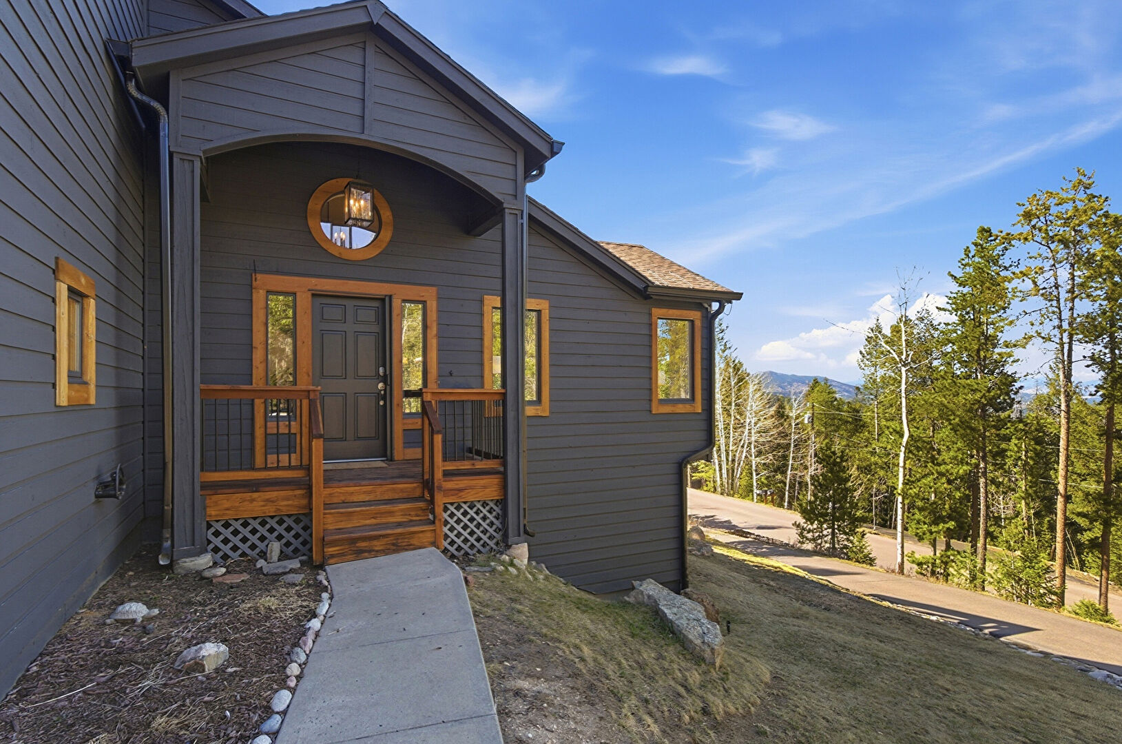 Exterior Entry at 8424 South Armadillo Trail, Evergreen, CO 80439, listed by Matt Bachus