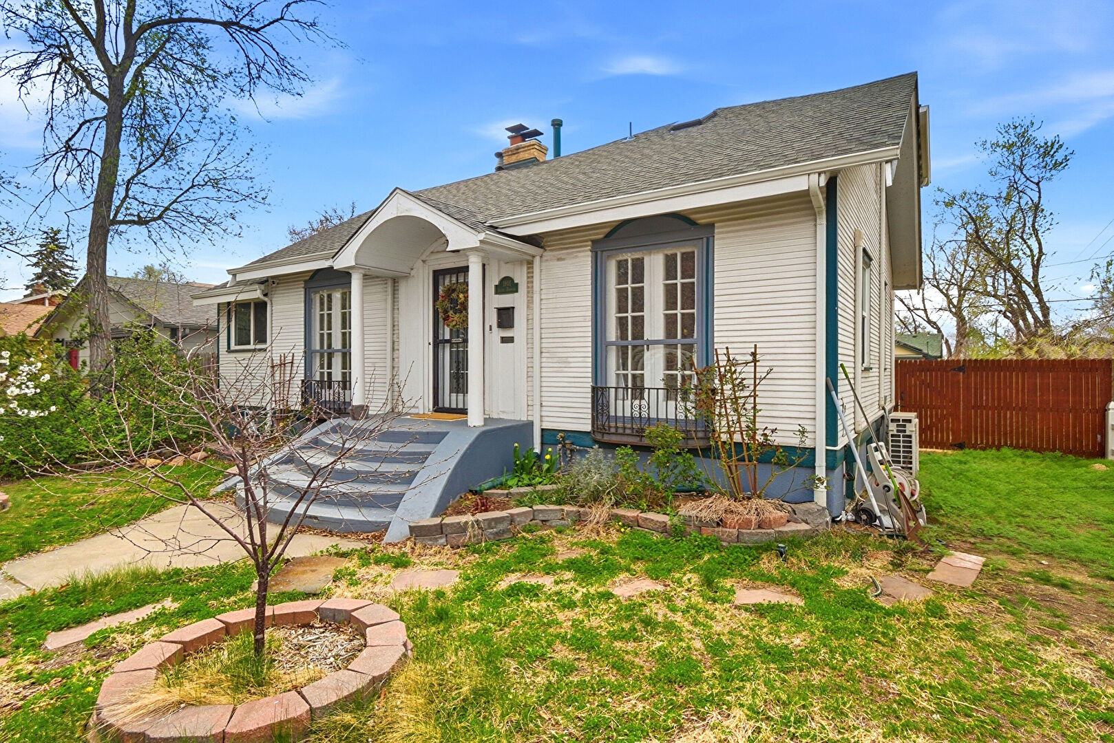 Front at 1801 South Downing Street, Denver, CO 80210, listed by Ambierre Rediger