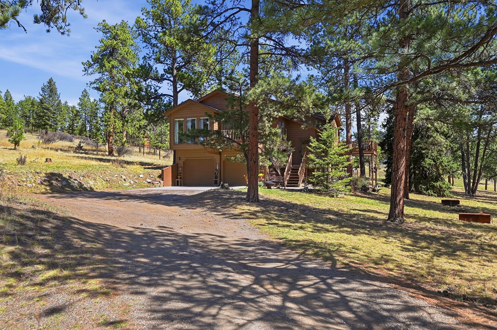 Front at 13712 Wamblee Valley Road, COnifer, CO 80433, listed by Jodi Dolph