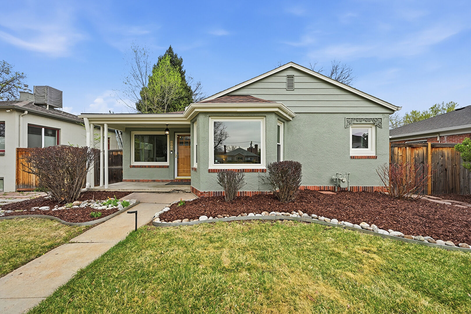 Front at 2010 South Saint Paul Street, Denver, CO 80210, listed by Brianna Griffin