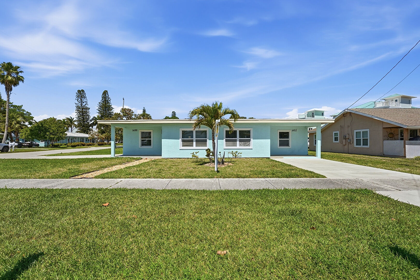 Front at 1400 & 1402 Binney Drive, Fort Pierce, FL 34949, listed by Margaret Good