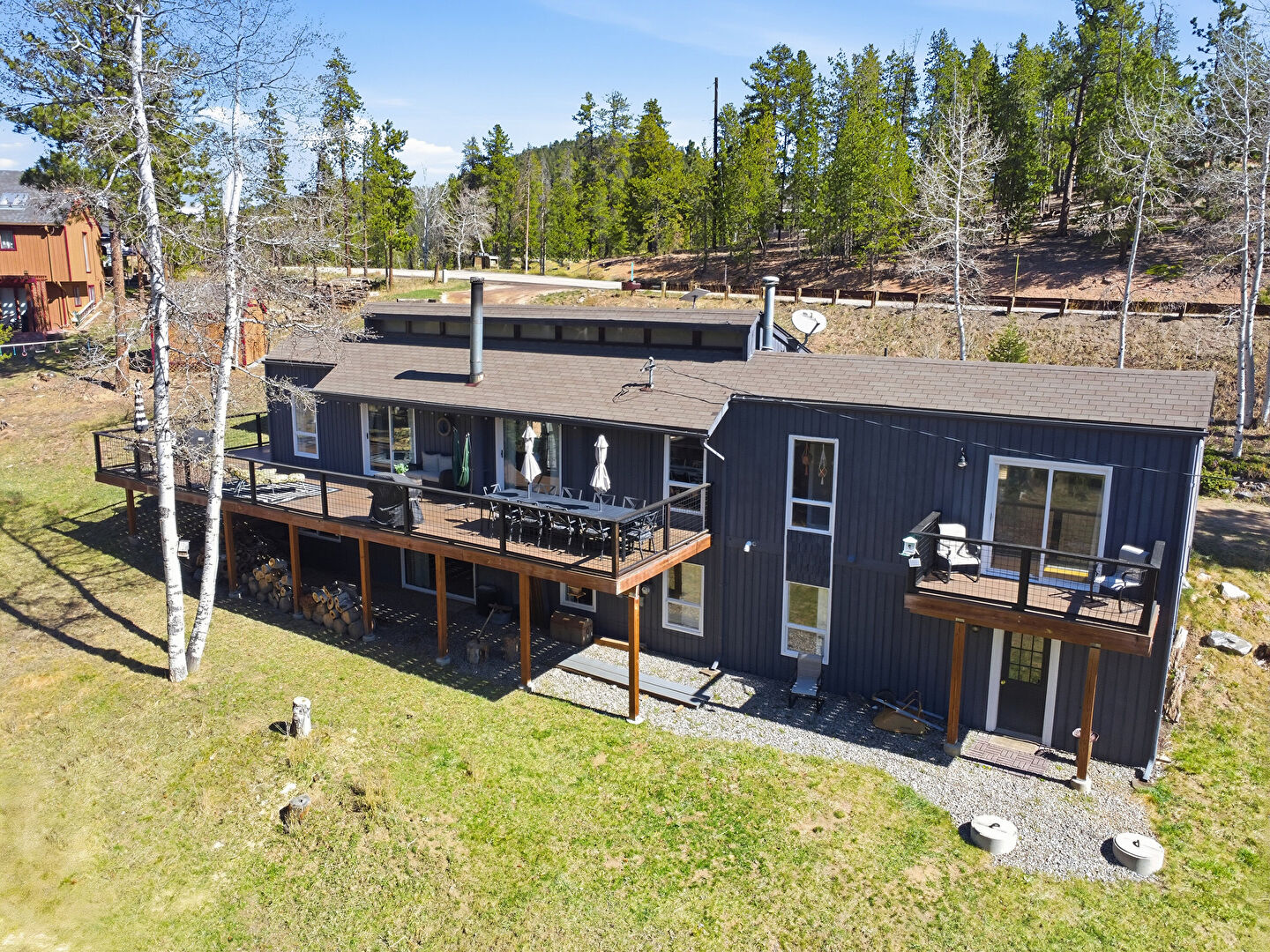 Back at 34978 Forest Estates Road, Evergreen, CO 80439, listed by Matt Bachus