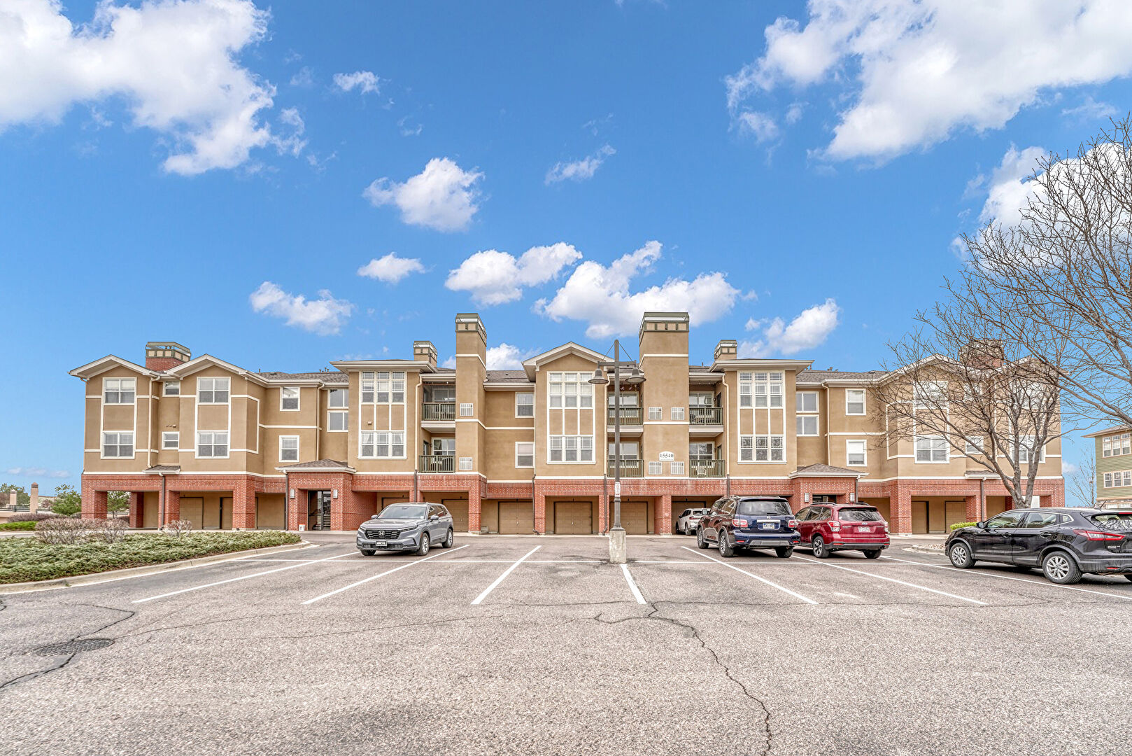 Front at 15540 Canyon Gulch Lane #210, Englewood, CO 80112, listed by Christine Rubino