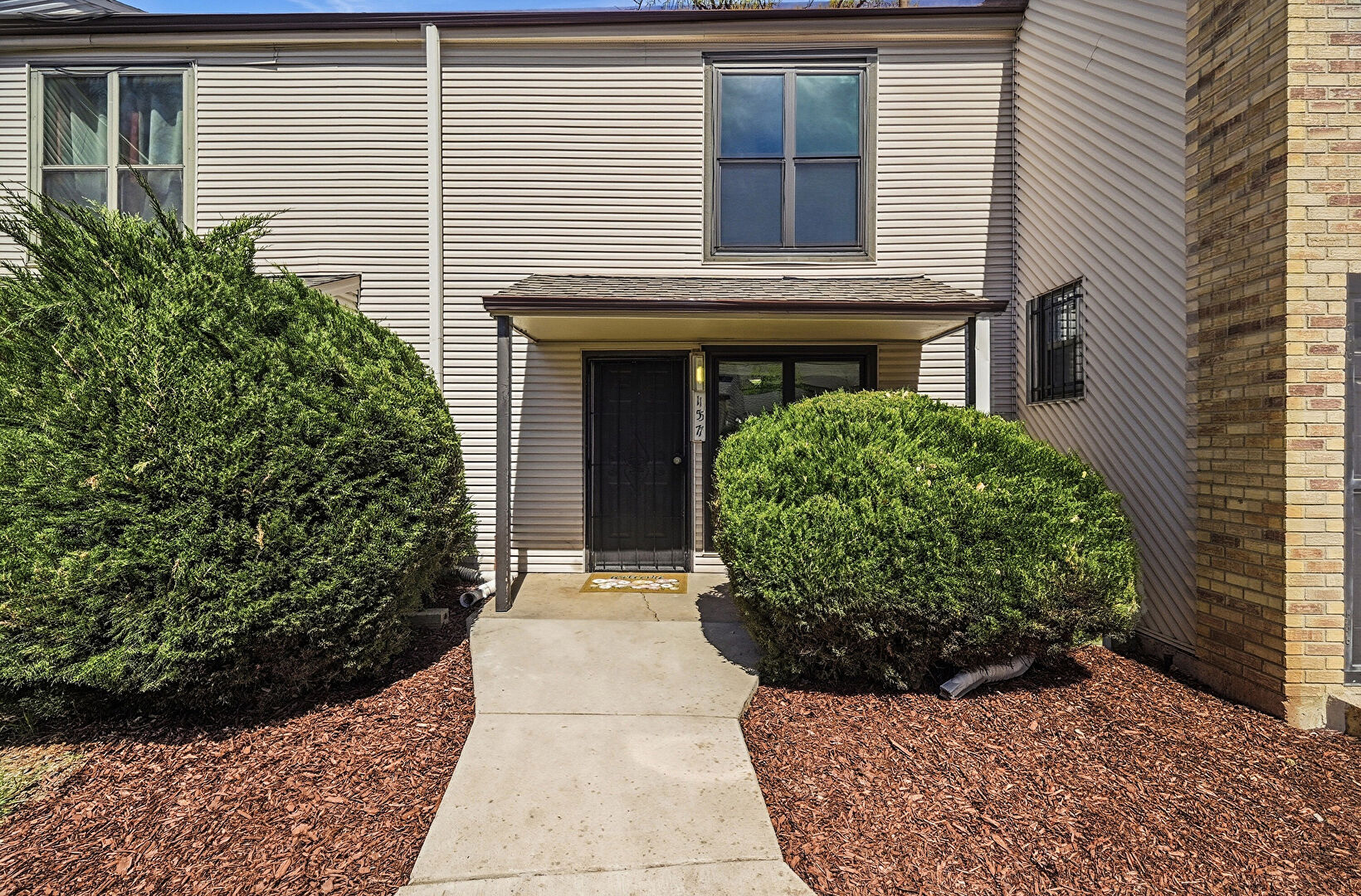 Front at 3550 South Harlan Street, Unit 157, Denver, CO 80235, listed by Rachael Osborne