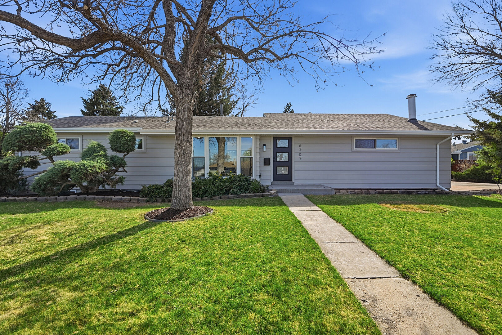 Front at 6707 South Birch Way, Centennial, CO 80122, listed by Sarah Thomas