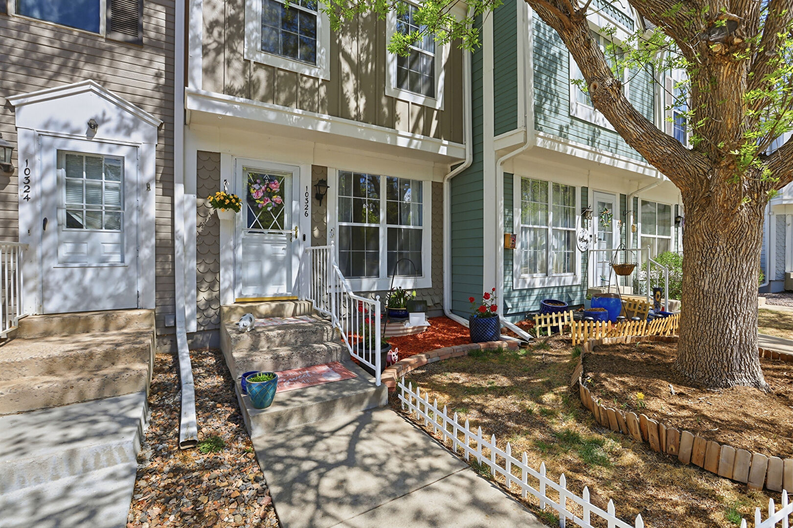 Exterior Entry at 10326 West Dartmouth Avenue, Lakewood, CO 80227, listed by Jeannette Ivy, MLS ID: 9612553