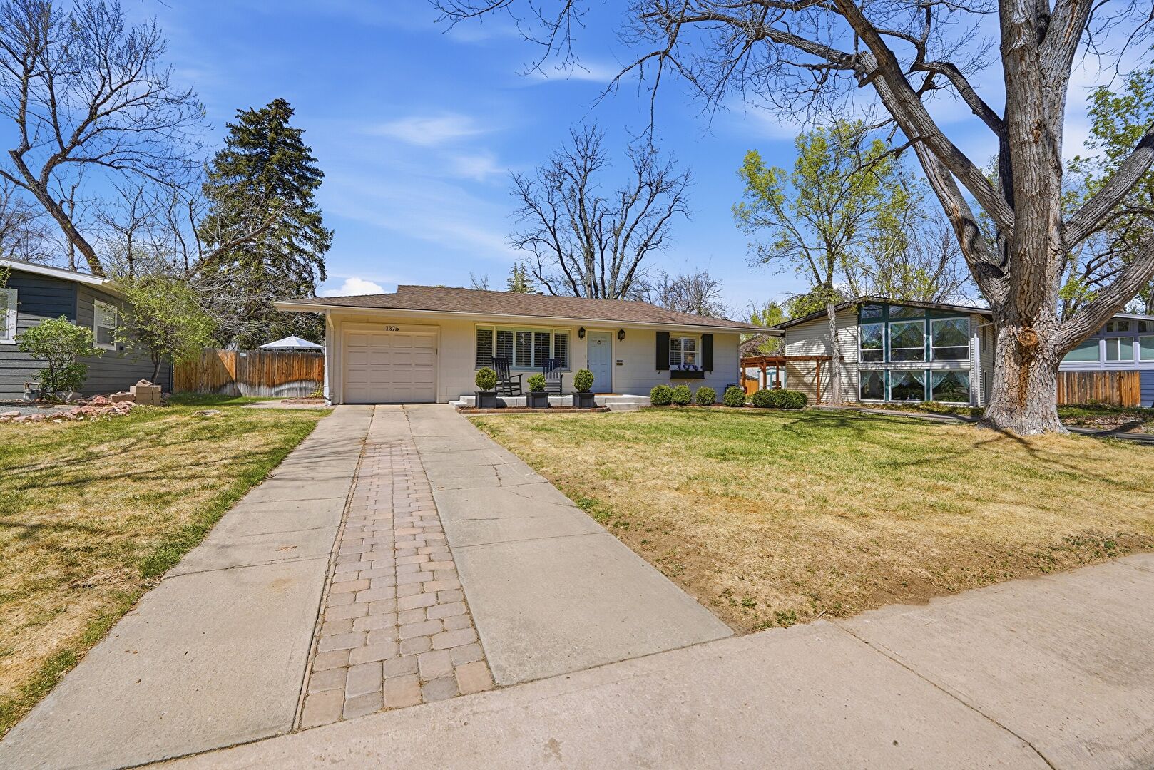 Front at 1375 South Ivy Way, Denver, CO 80224, listed by Russ Porter