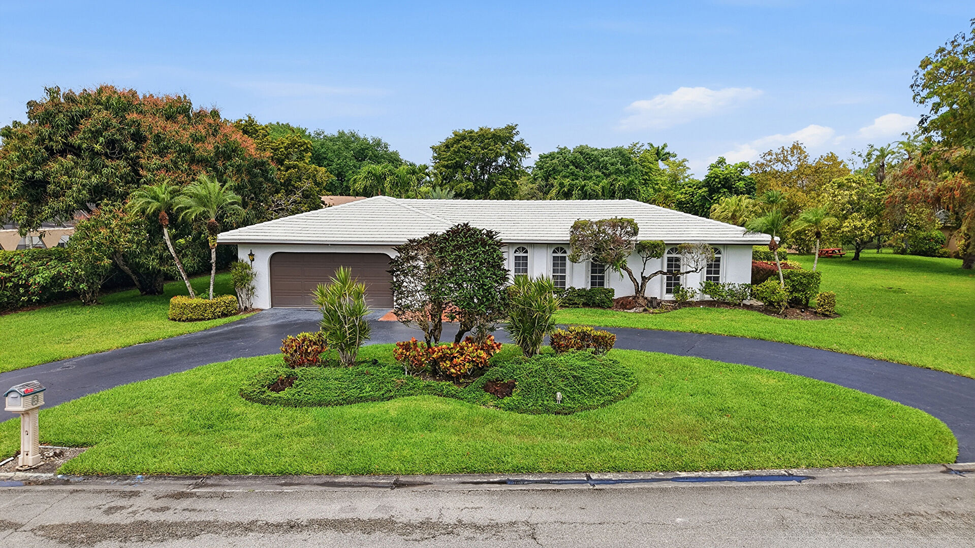 Front at 2620 Northwest 106th Drive, Coral Springs, FL 33065, listed by Laura Sanders