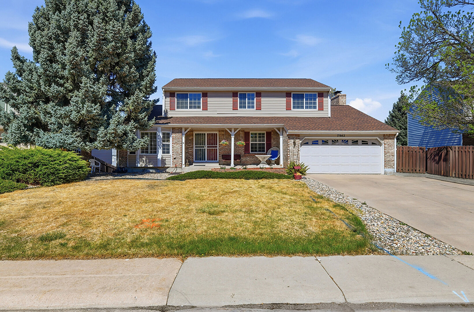 Front at 7942 South Corona Court, Centennial, CO 80122, listed by Ray Hubert