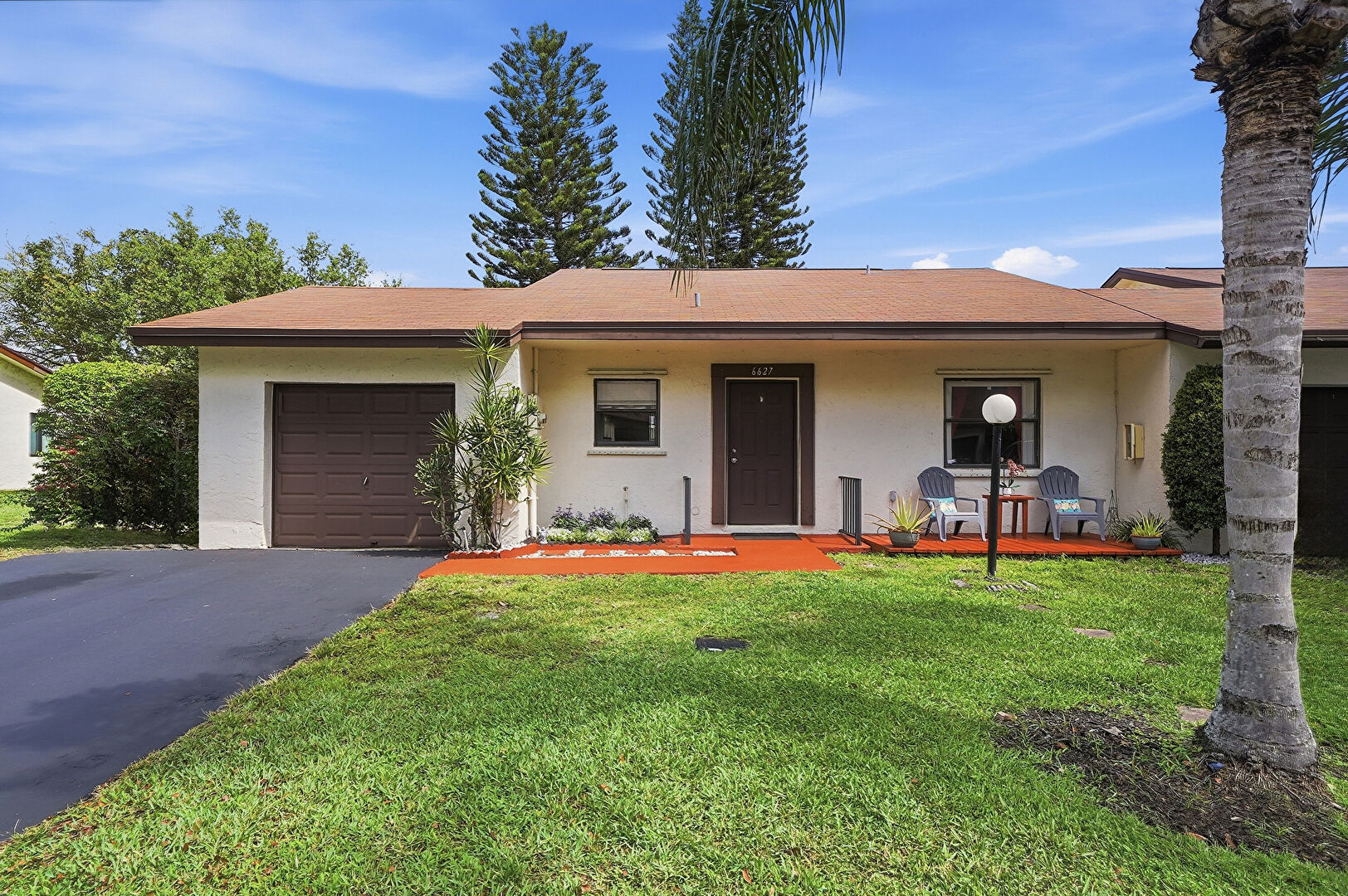 Front at 6627 North Parkway Drive, #1-4, Margate, FL 33068, listed by Laura Sanders