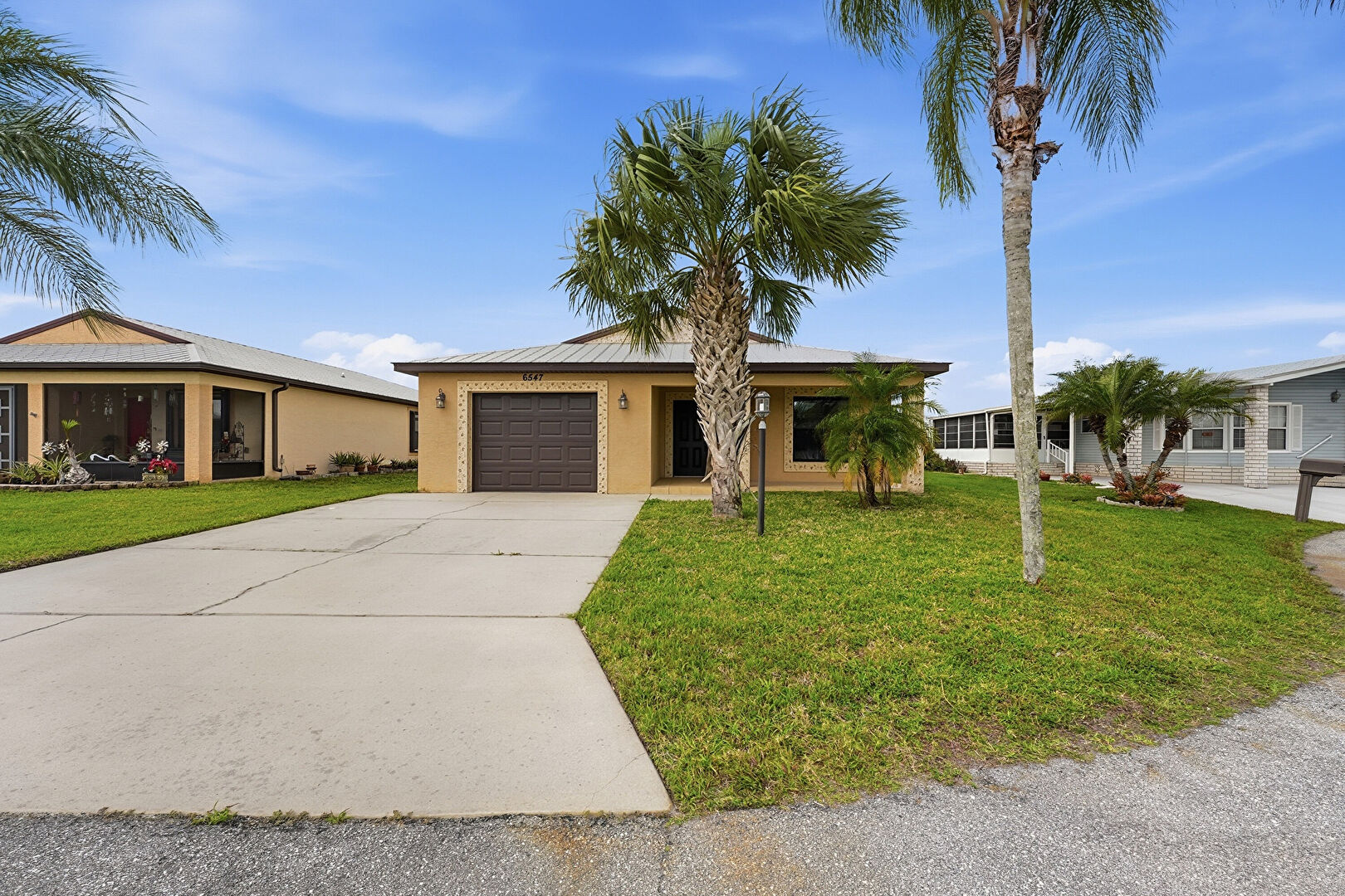 Front at 6547 Zapote Court, Fort Pierce, FL 34951, listed by Jason M Coley