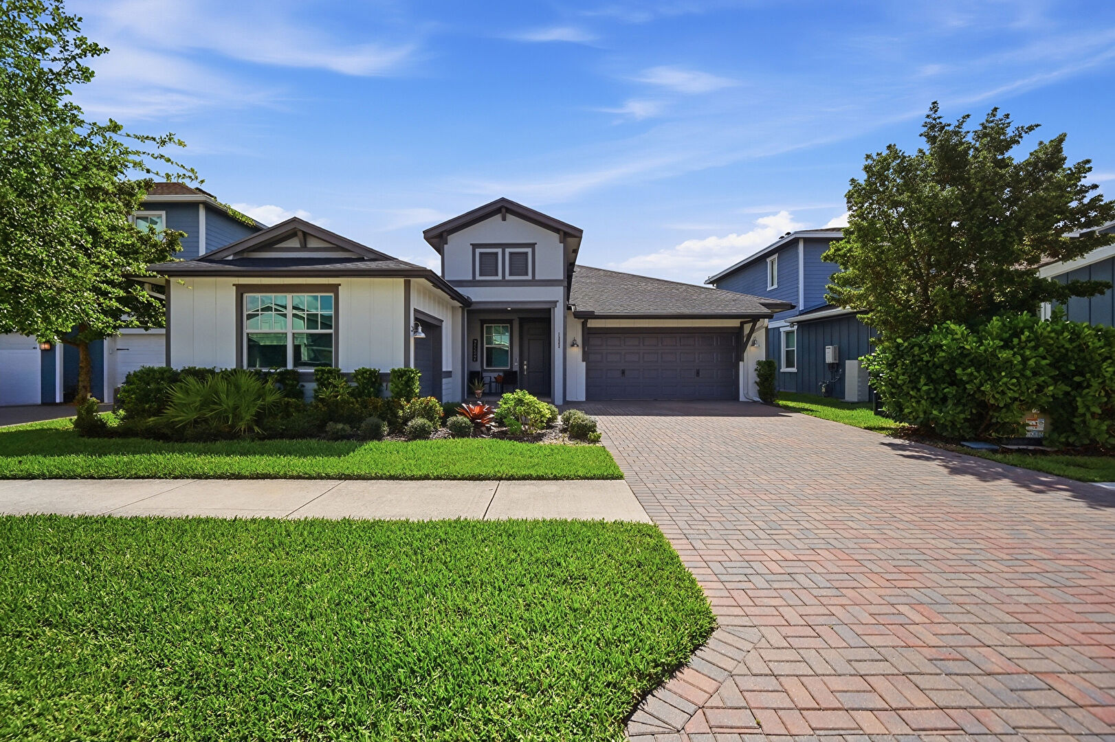 Front yard at 1322 Timber Reap Trl, Loxahatchee, FL 33470, listed by Kelsy Sanchez
