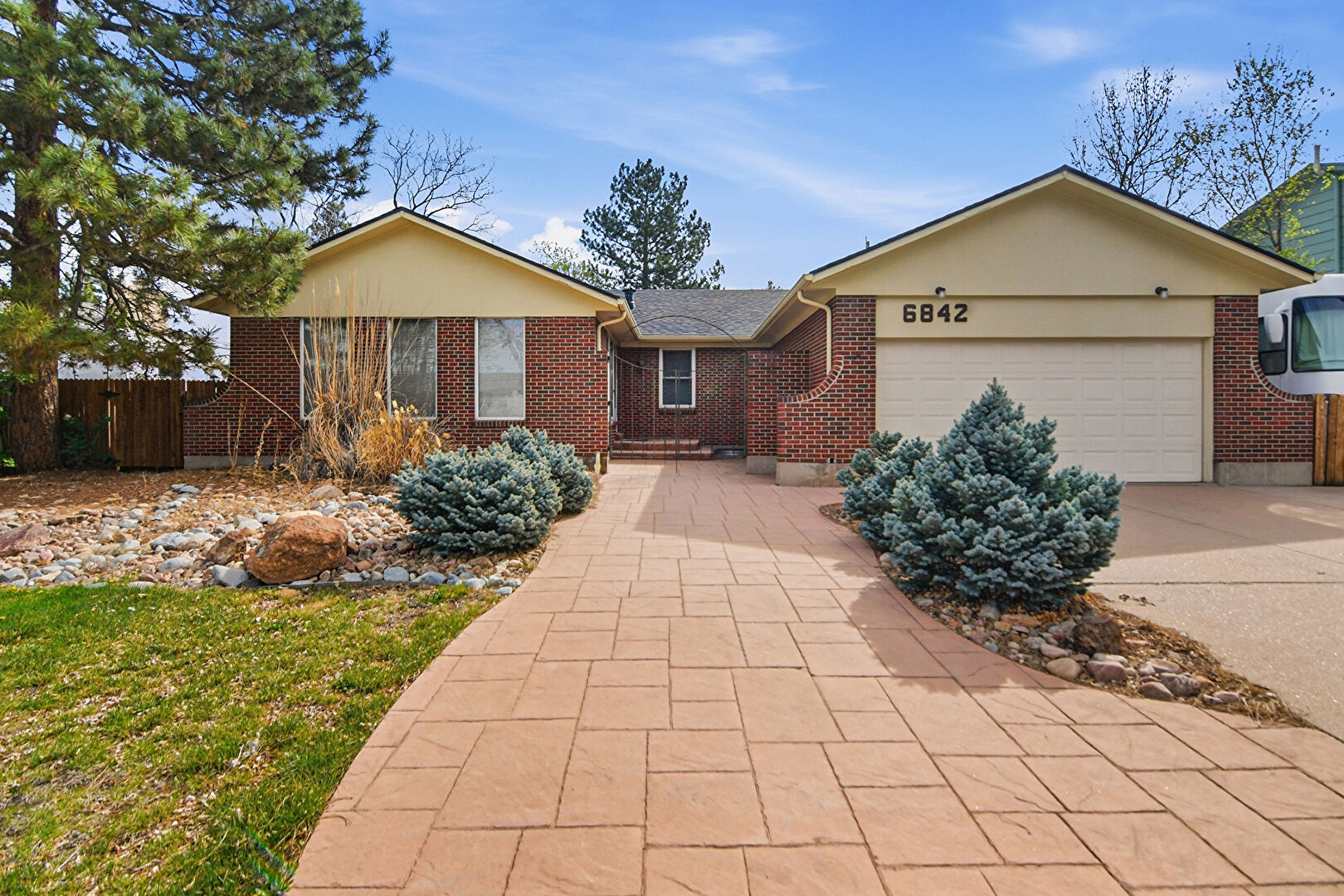 Front at 6842 South High Street, Centennial, CO 80122, listed by Alex Katsenelson