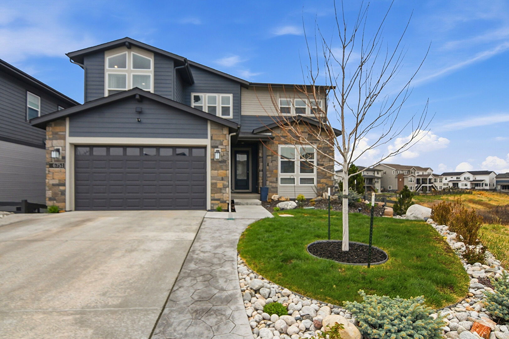 Front at 6751 Golden Sill Court, Castle Pines, CO 80108, listed by Jerid Wempen