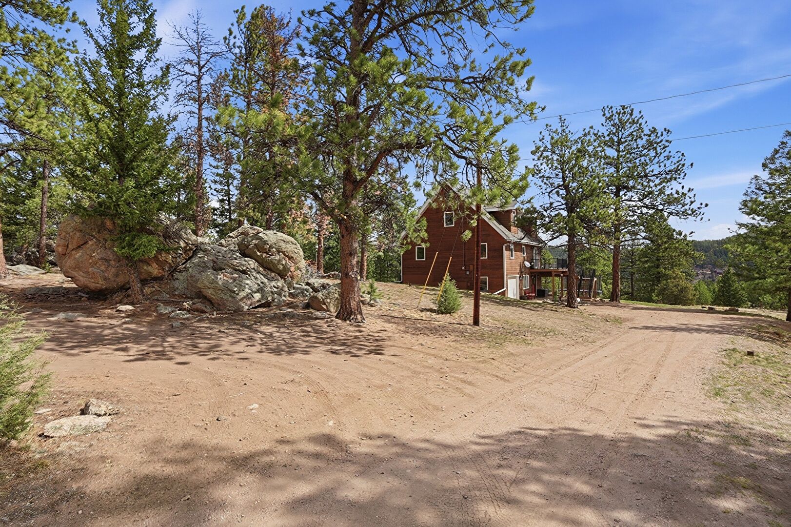 Front at 4718 County Road 72, Bailey, CO 80421, listed by Jessica Ford