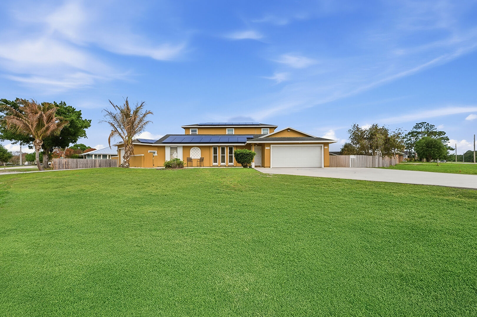 Front at 2301 Southwest Barber Lane, Port St. Lucie, FL 34984, listed by Carline Lynch