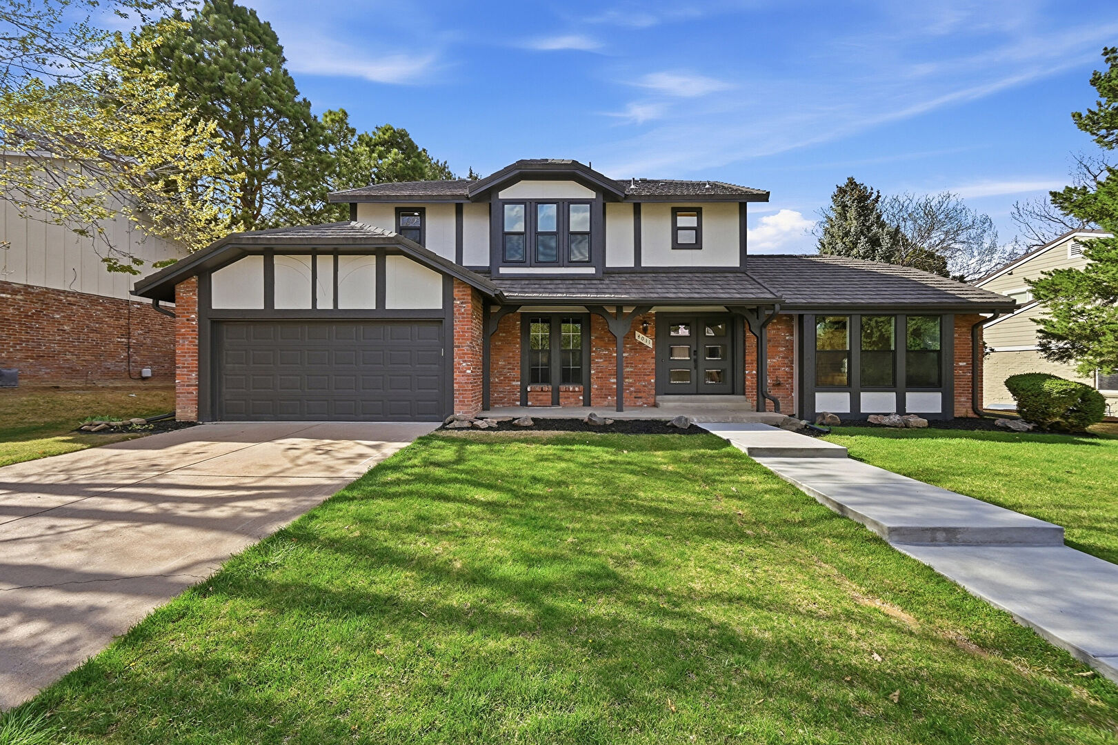 Front at 4011 South Magnolia Way, Denver, CO 80237, listed by Eric Ybarra