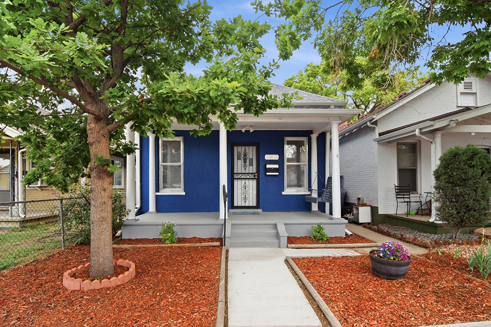 Front at 4424 Sherman Street, Denver, CO 80216, listed by Kelly Dolph