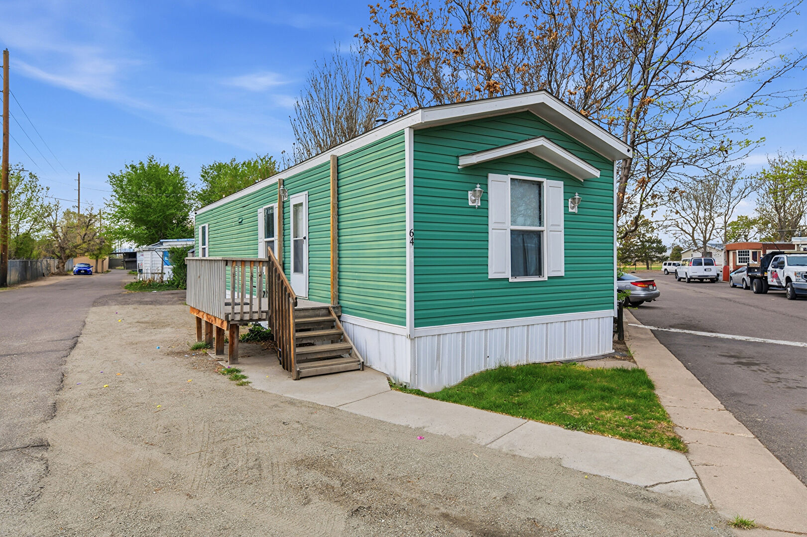 Front at 6791 Colorado 2, Lot 64, Commerce City, CO 80022, listed by Nubia Cereceres