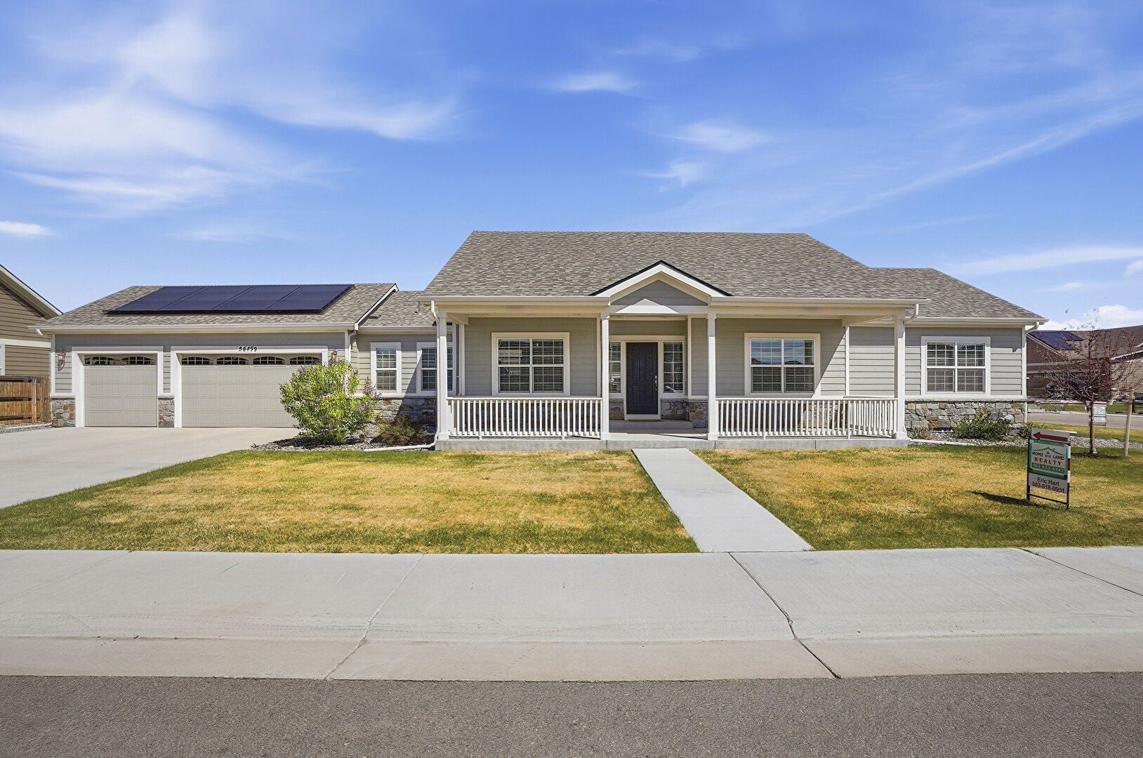 Front at 56499 E. 23rd Place, Strasburg, CO 80136, listed by Eric Hart