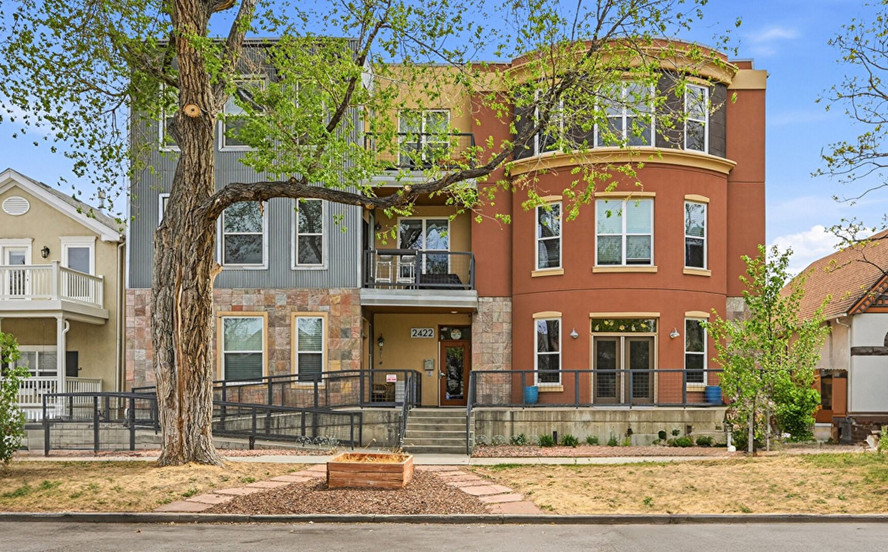 Property Exterior at 2422 Tremont Place, Denver, CO 80205, listed by Ashley King