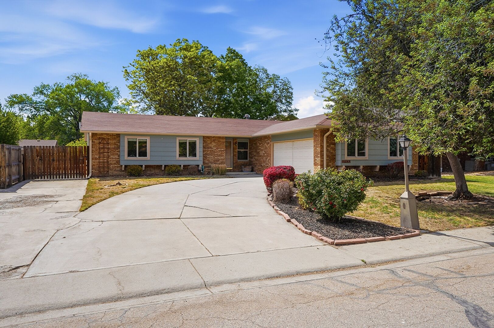 Front at 1689 Geneva Circle, Longmont, CO 80503, listed by Patricia Turner