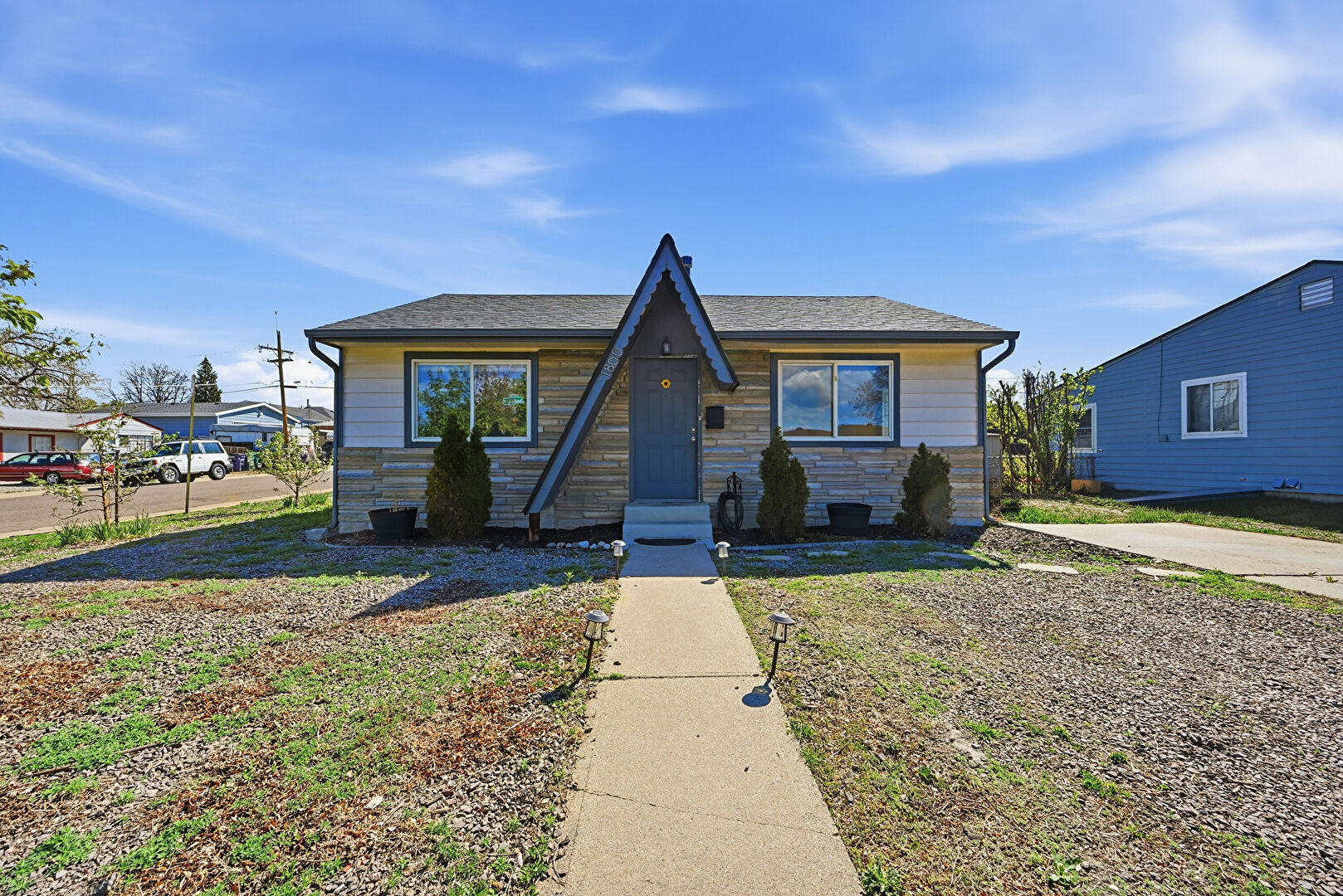 Front at 1800 South Shoshone Street, Denver, CO 80223, listed by Taylor Haas