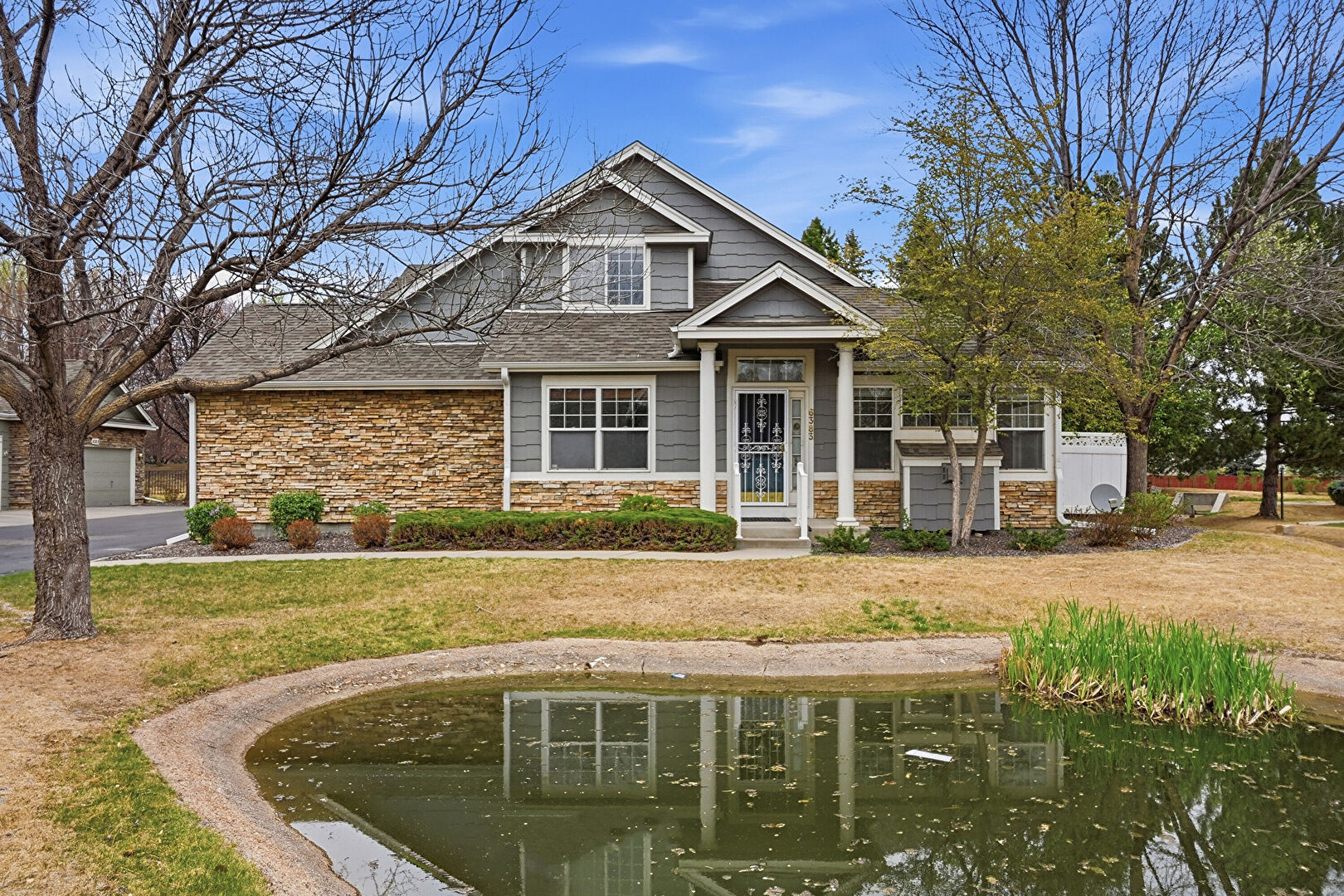 Front at 6383 Deframe Way, Arvada, CO 80004, listed by Julie Leins