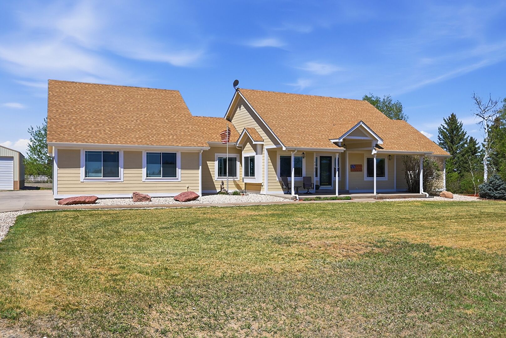 Front at 4031 Burton Street, Strasburg, CO 80136, listed by Christina Kern