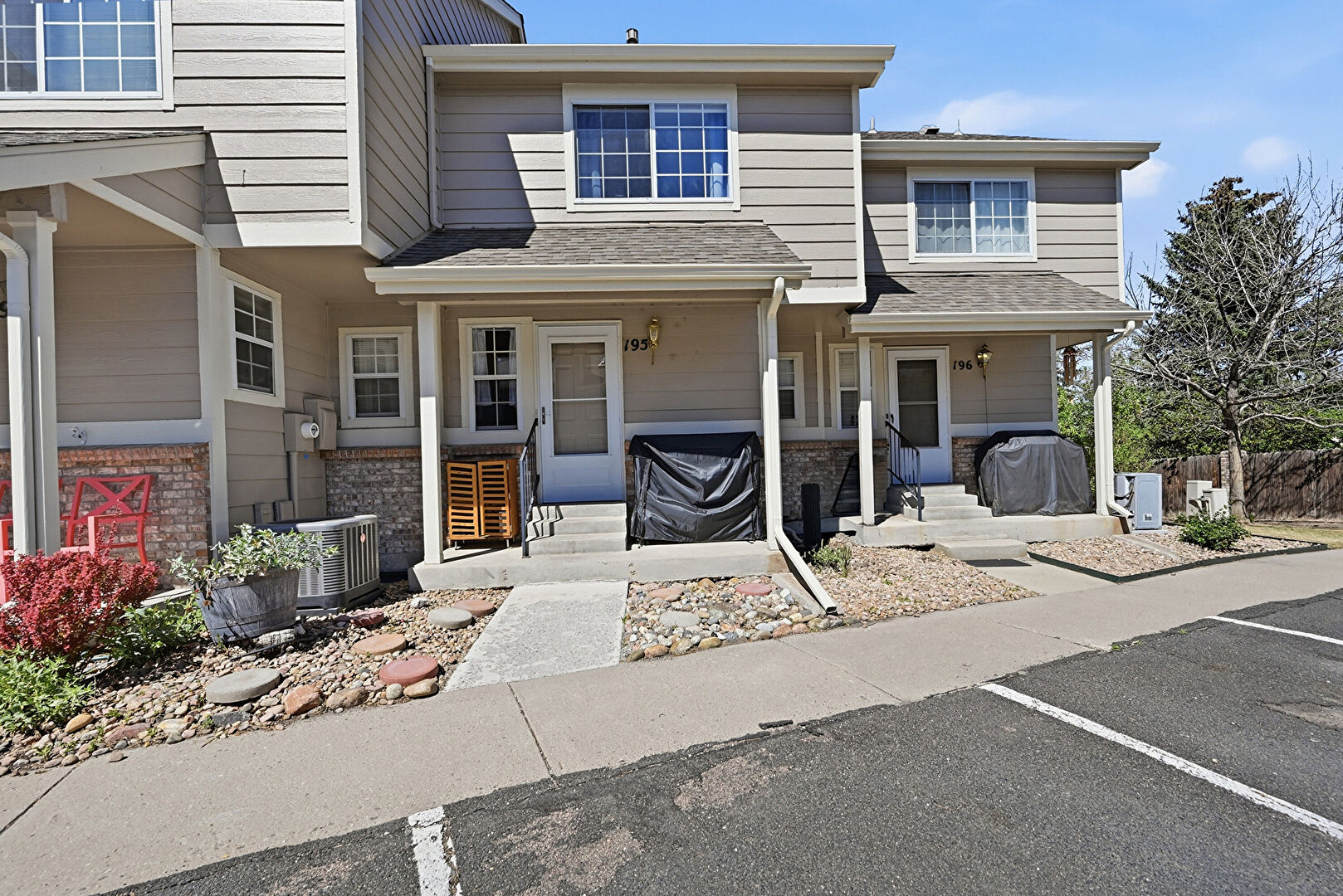 Front at 1470 South Quebec Way, Denver, CO 80231, listed by Ted Peterson Care Real Estate