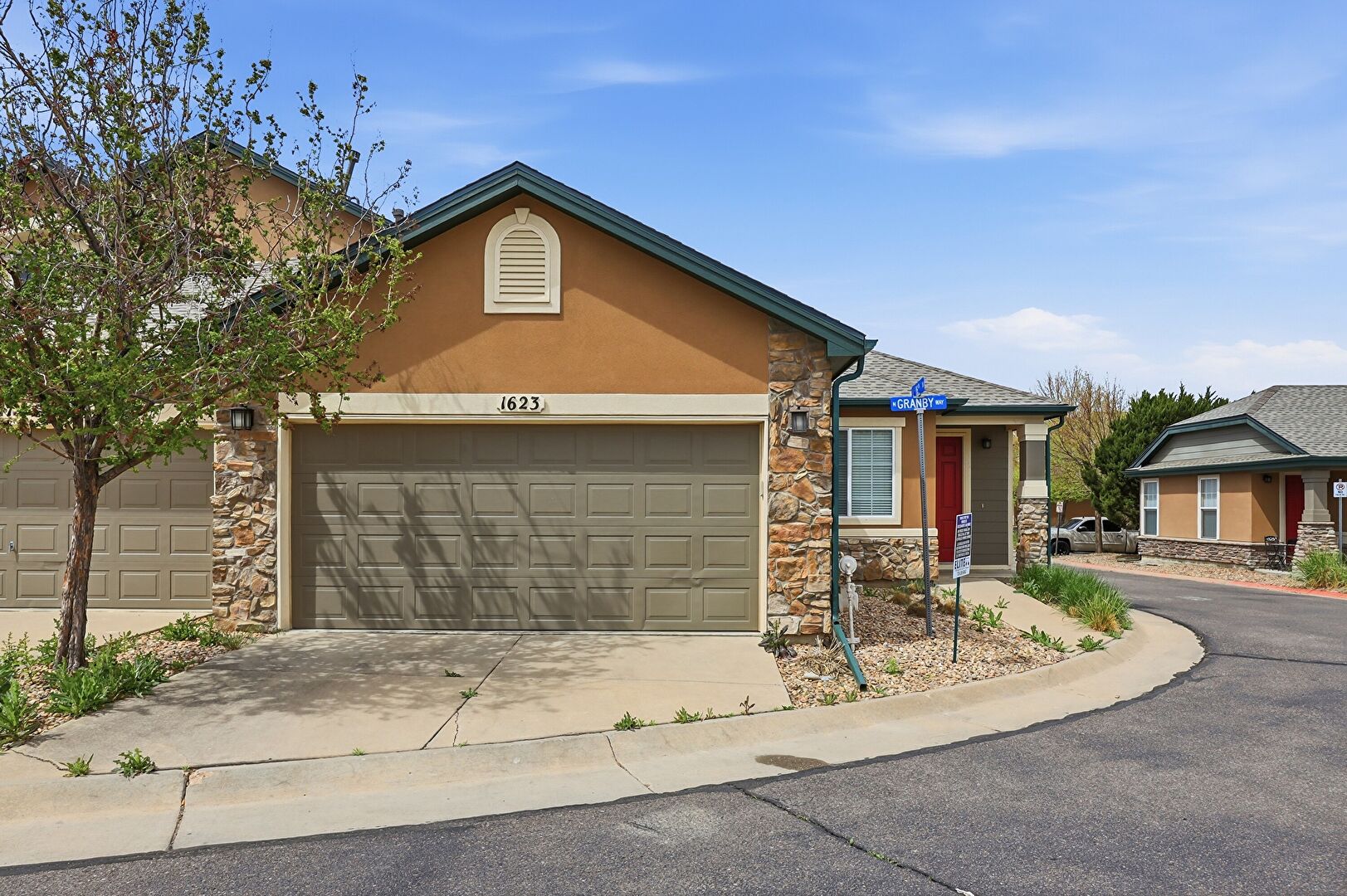Front at 1623 Granby Way, Aurora, CO 80011, listed by Ted Peterson Care Real Estate