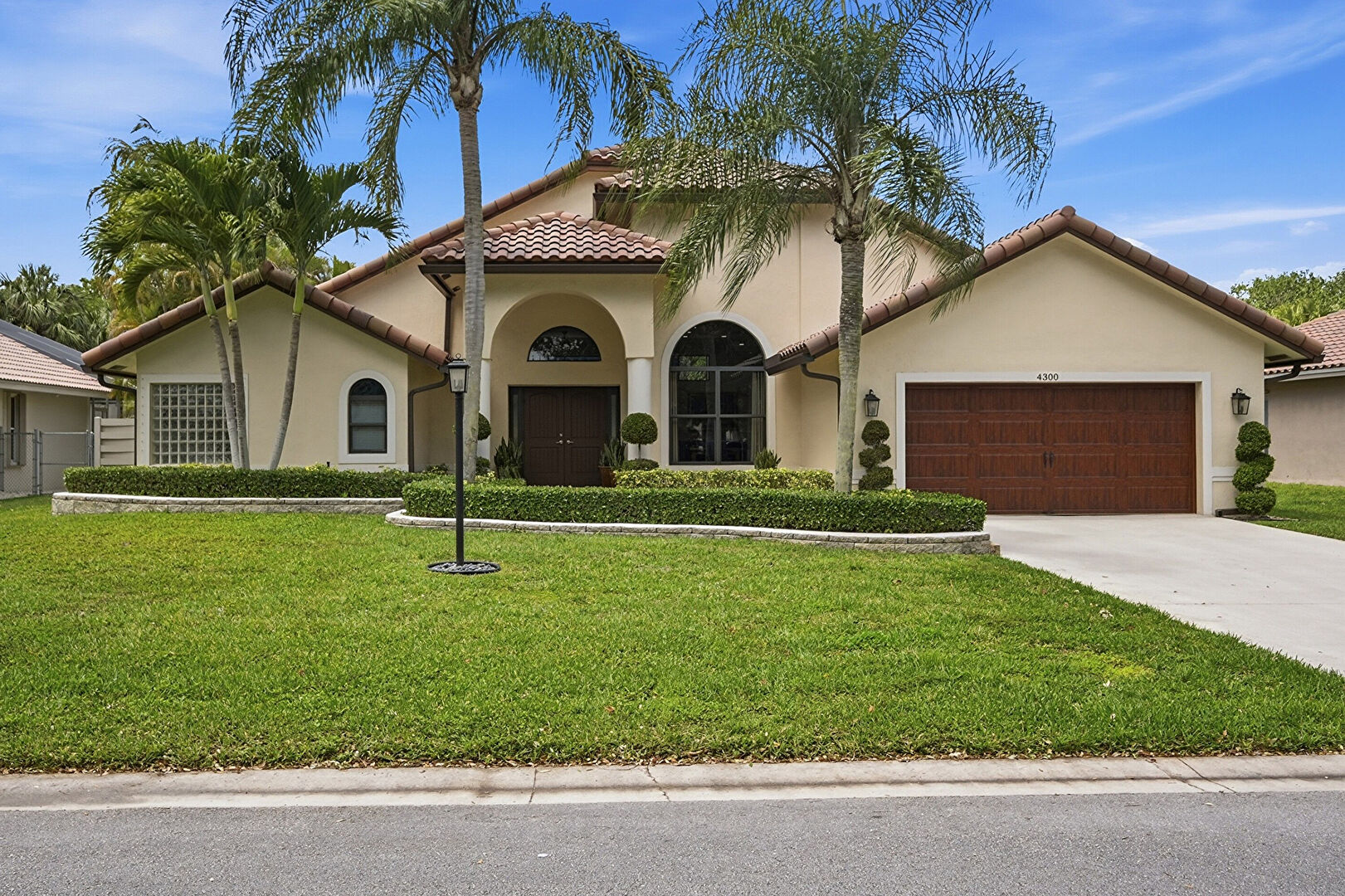 Front at 4300 Northwest 83rd Lane, Coral Springs, FL 33065, listed by Laura Sanders
