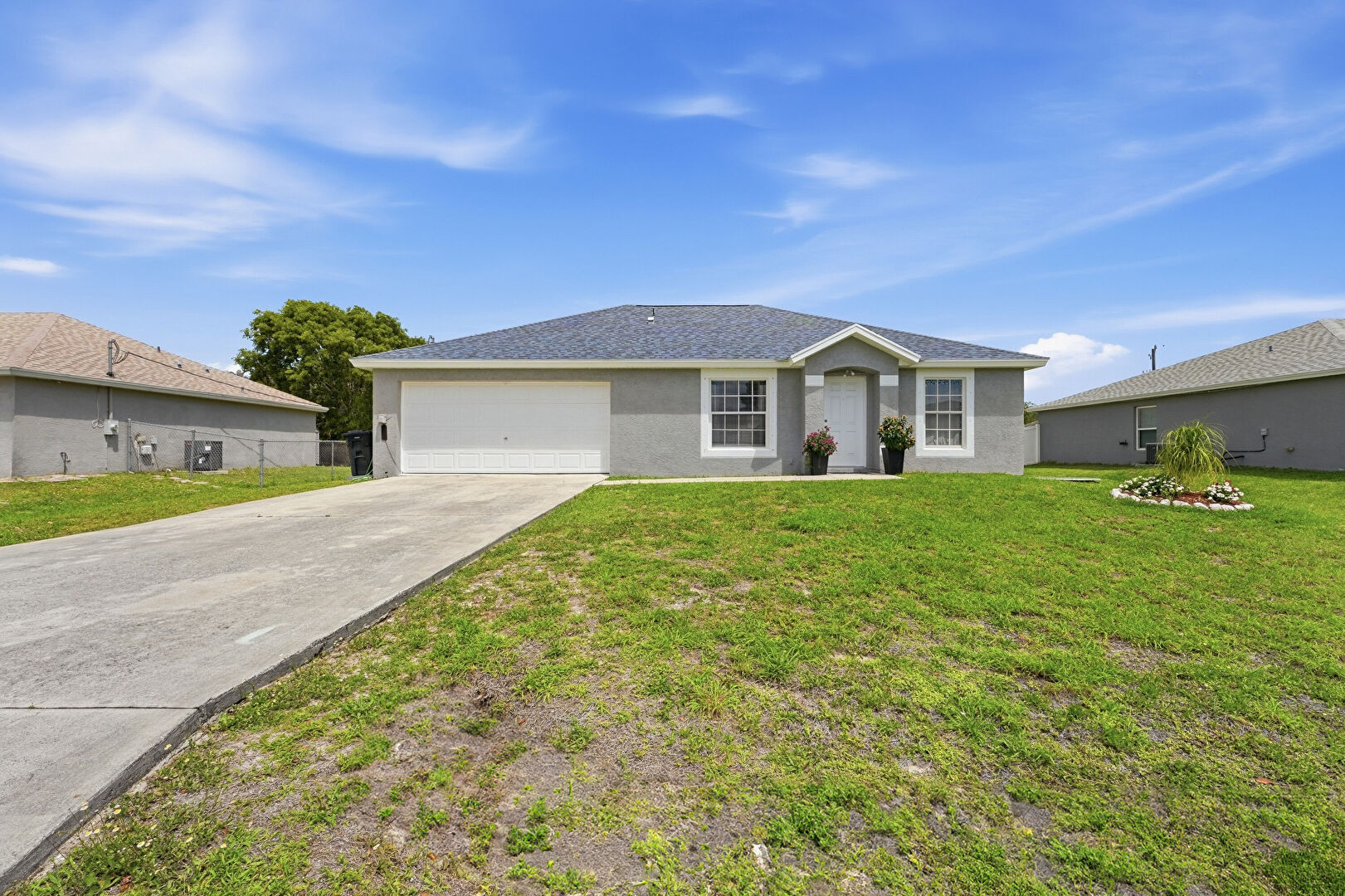 Front at 461 Southwest Exmore Avenue, Port St. Lucie, FL 34983, listed by Darren Goldstein Ron Bill