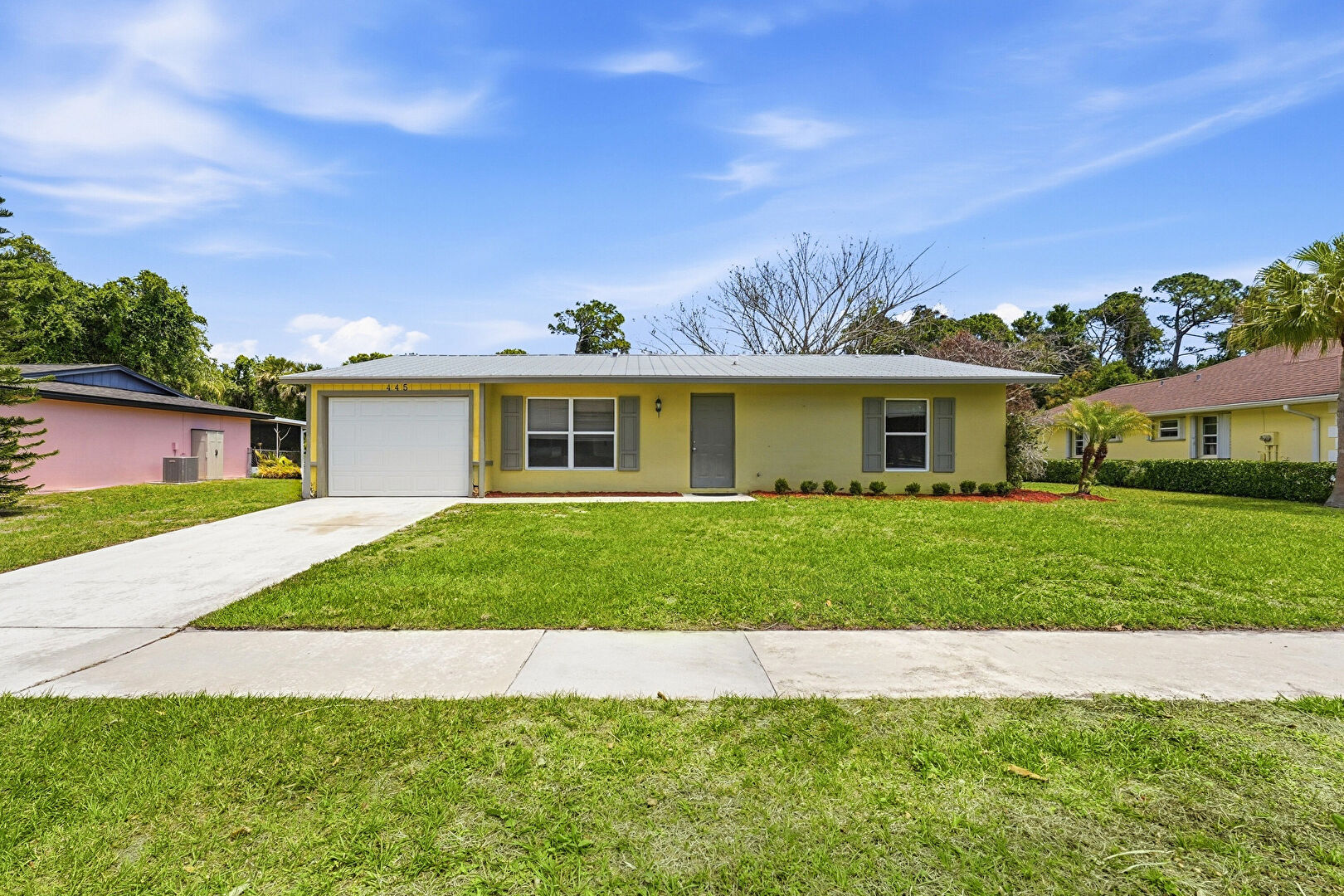 Front at 445 Northeast Armory Circle, Port St. Lucie, FL 34983, listed by Tristan Beavers