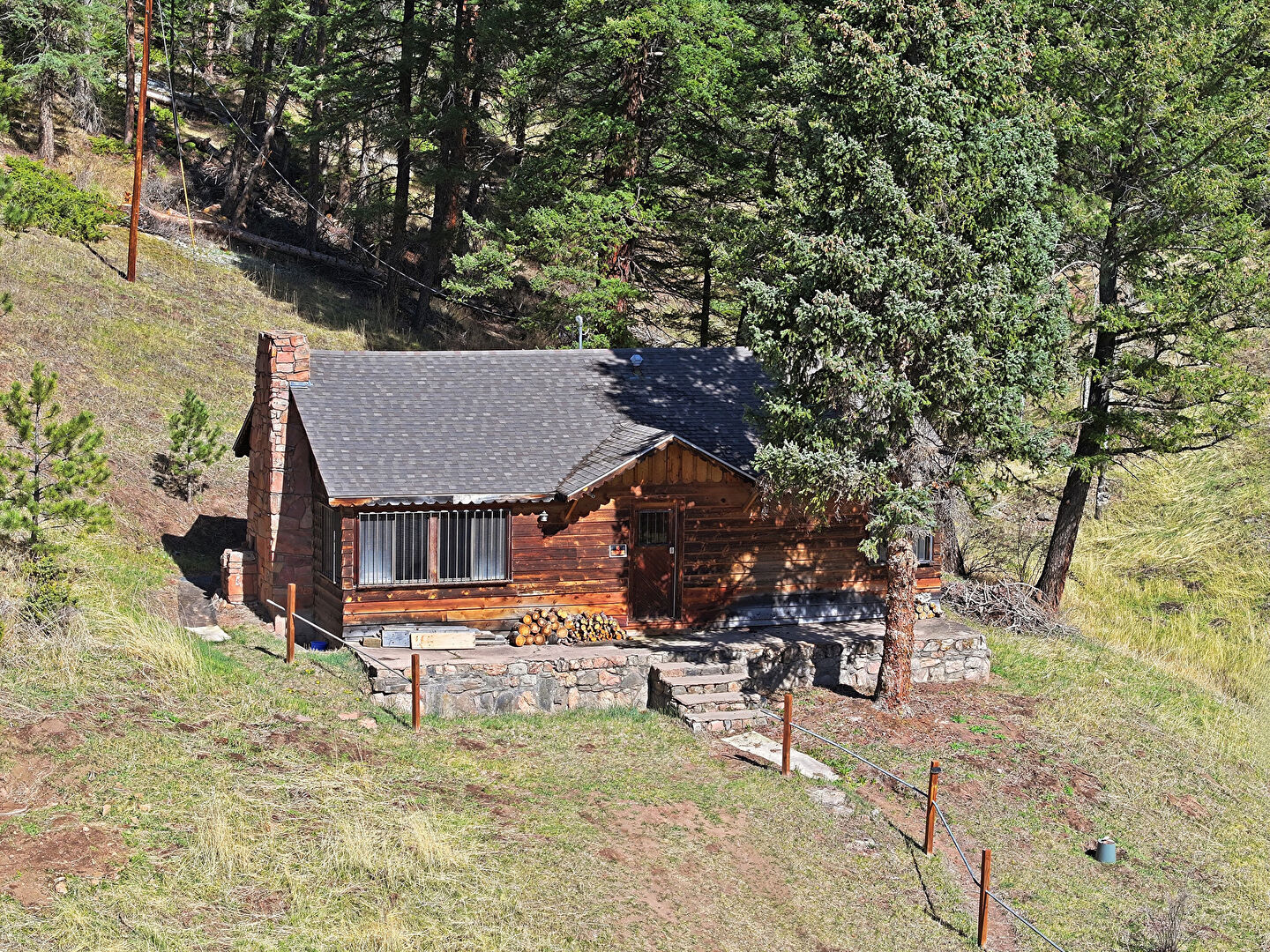 Front at 33601 Stransky Road, Evergreen, CO 80439, listed by Devon Cole