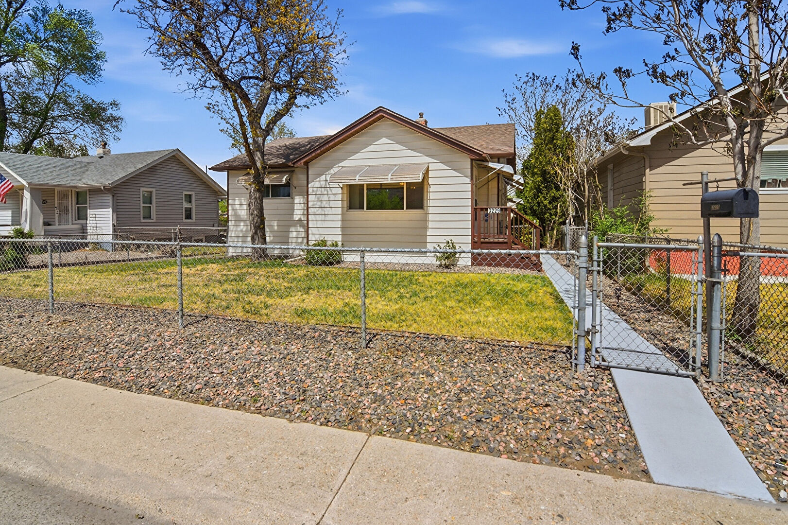 Front at 3229 W Exposition Ave, Denver, CO 80219, listed by Foster Gillis